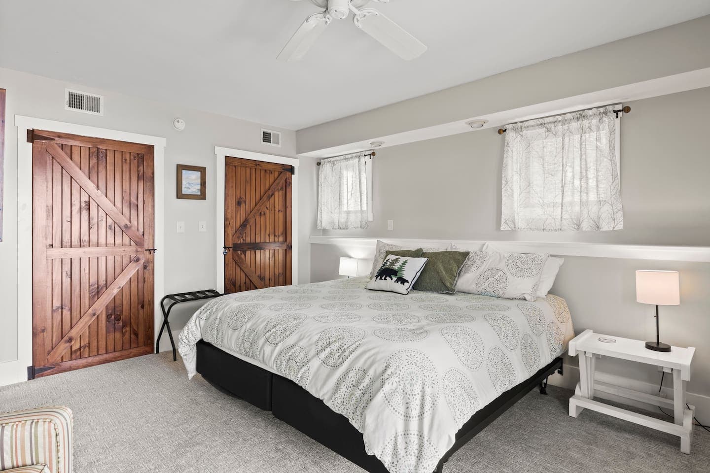First-floor king bedroom with neutral furnishings