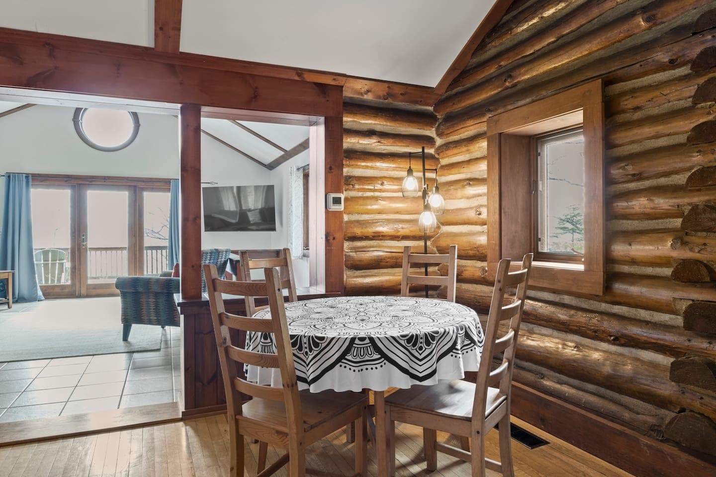 Log-paneled dining area 