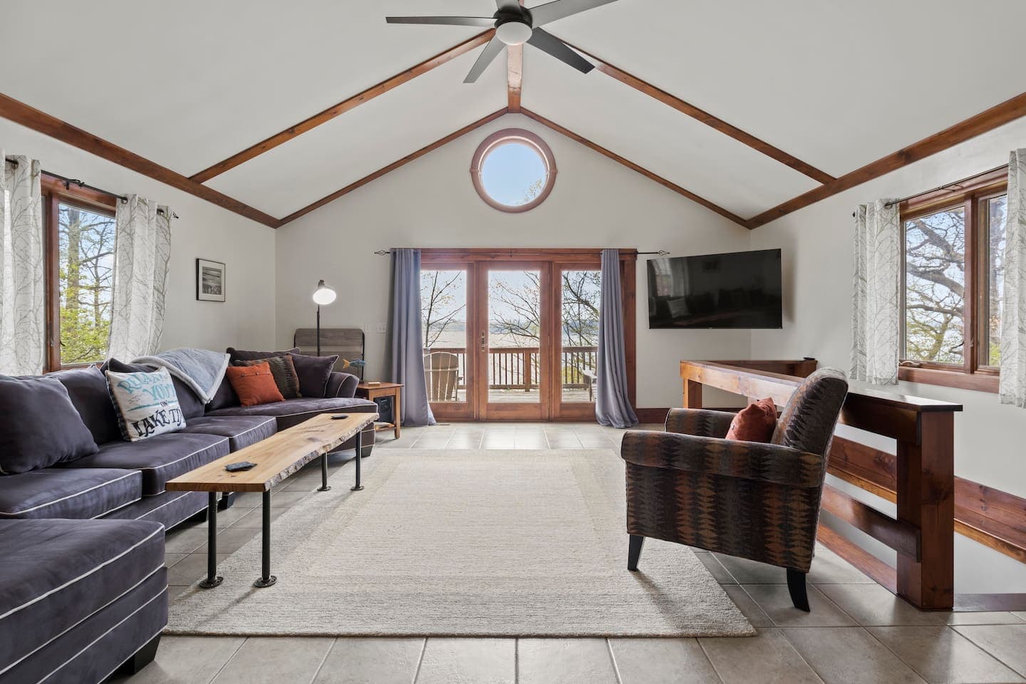 Second living room with sectional and television