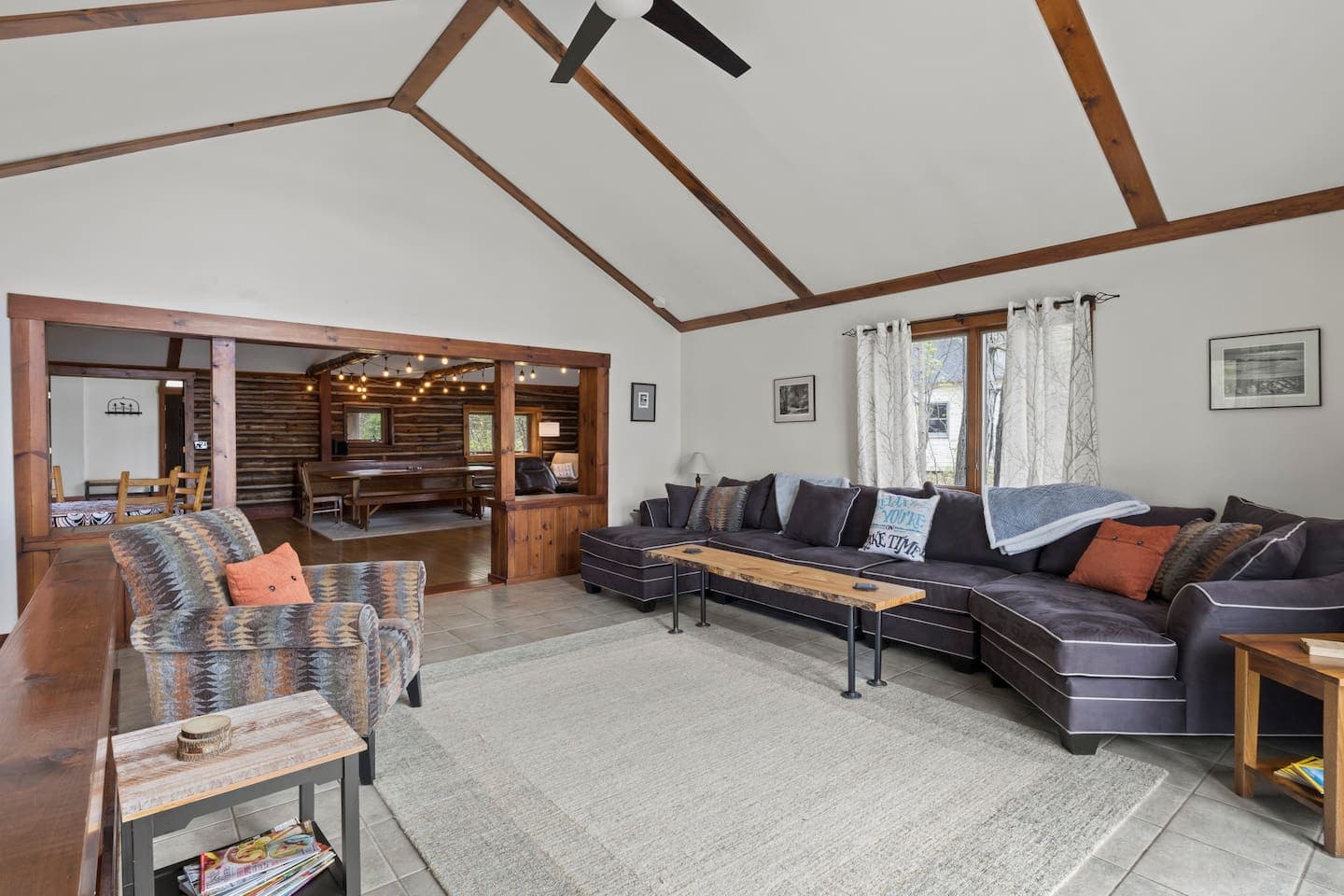 Spacious seating area beneath a vaulted ceiling