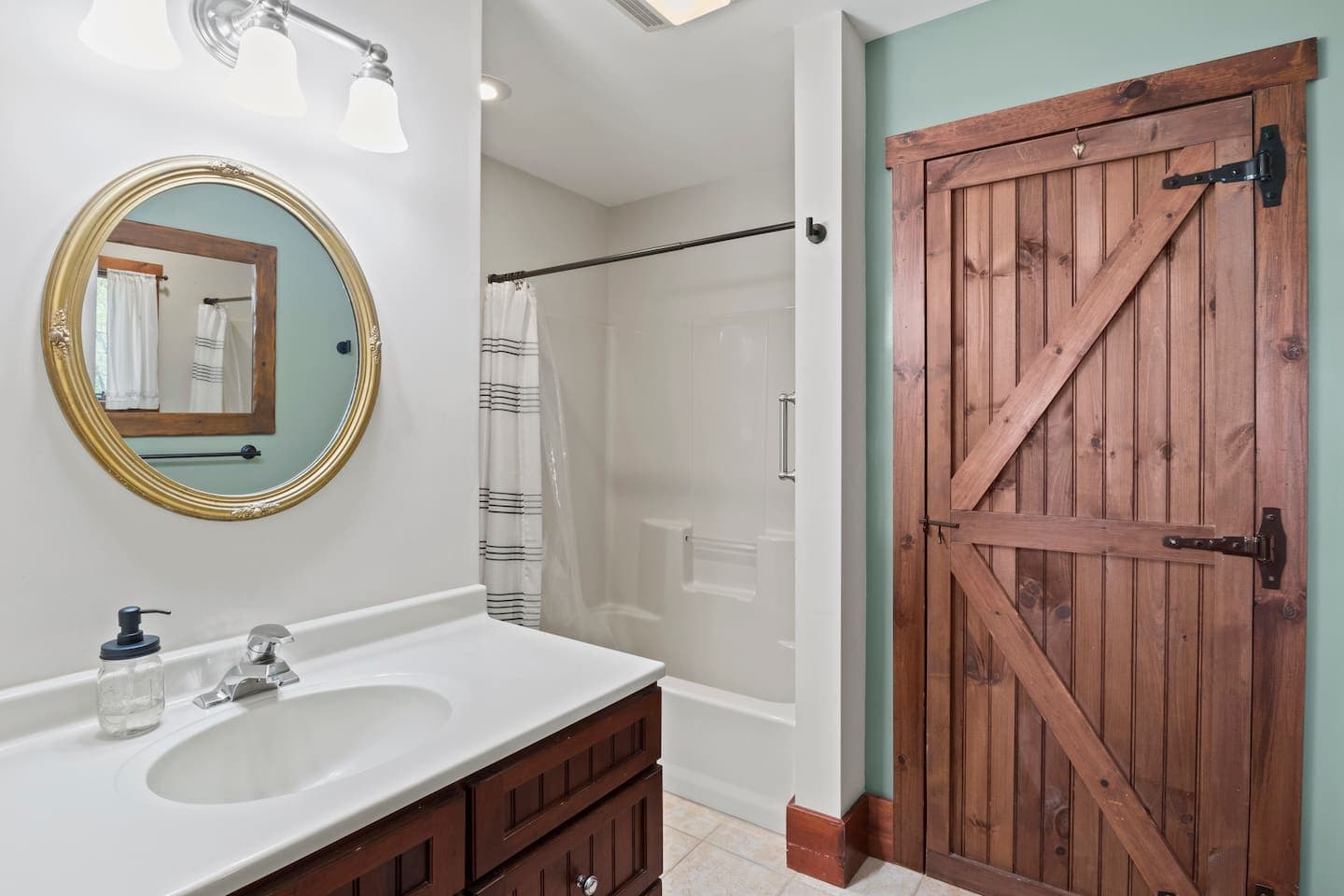 En-suite bathroom with shower and barn door