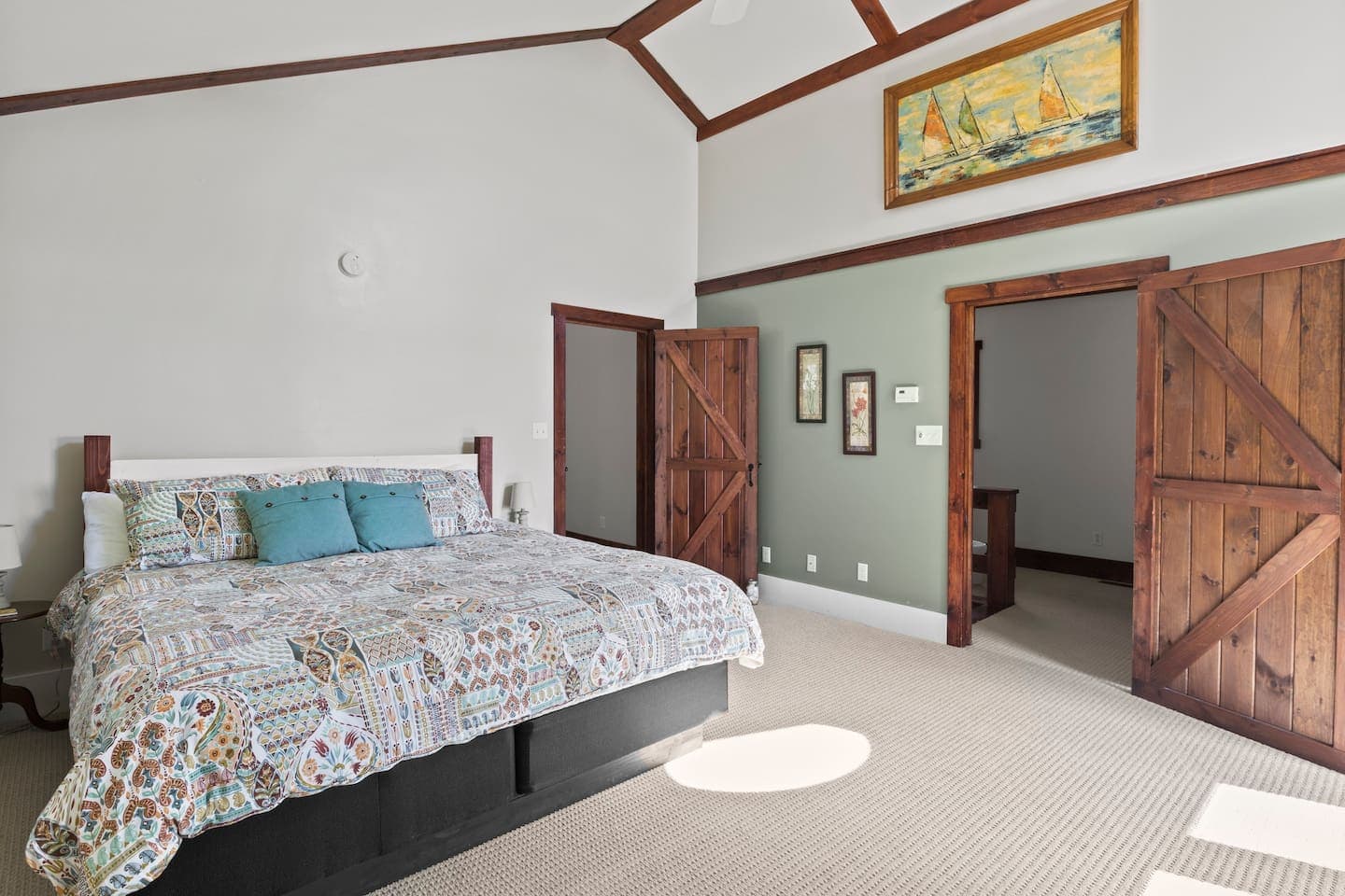 King bedroom with sliding barn doors