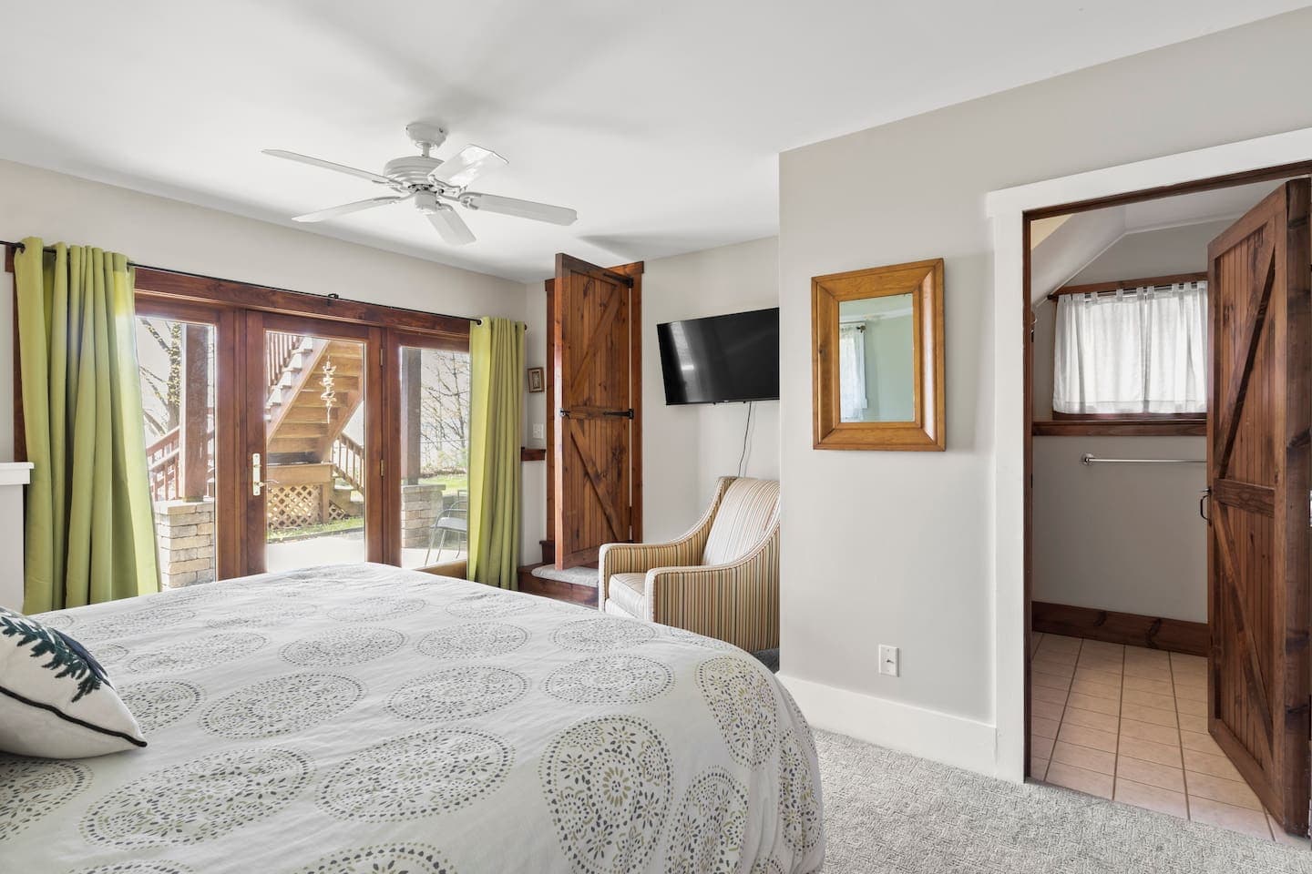 King bedroom with porch access