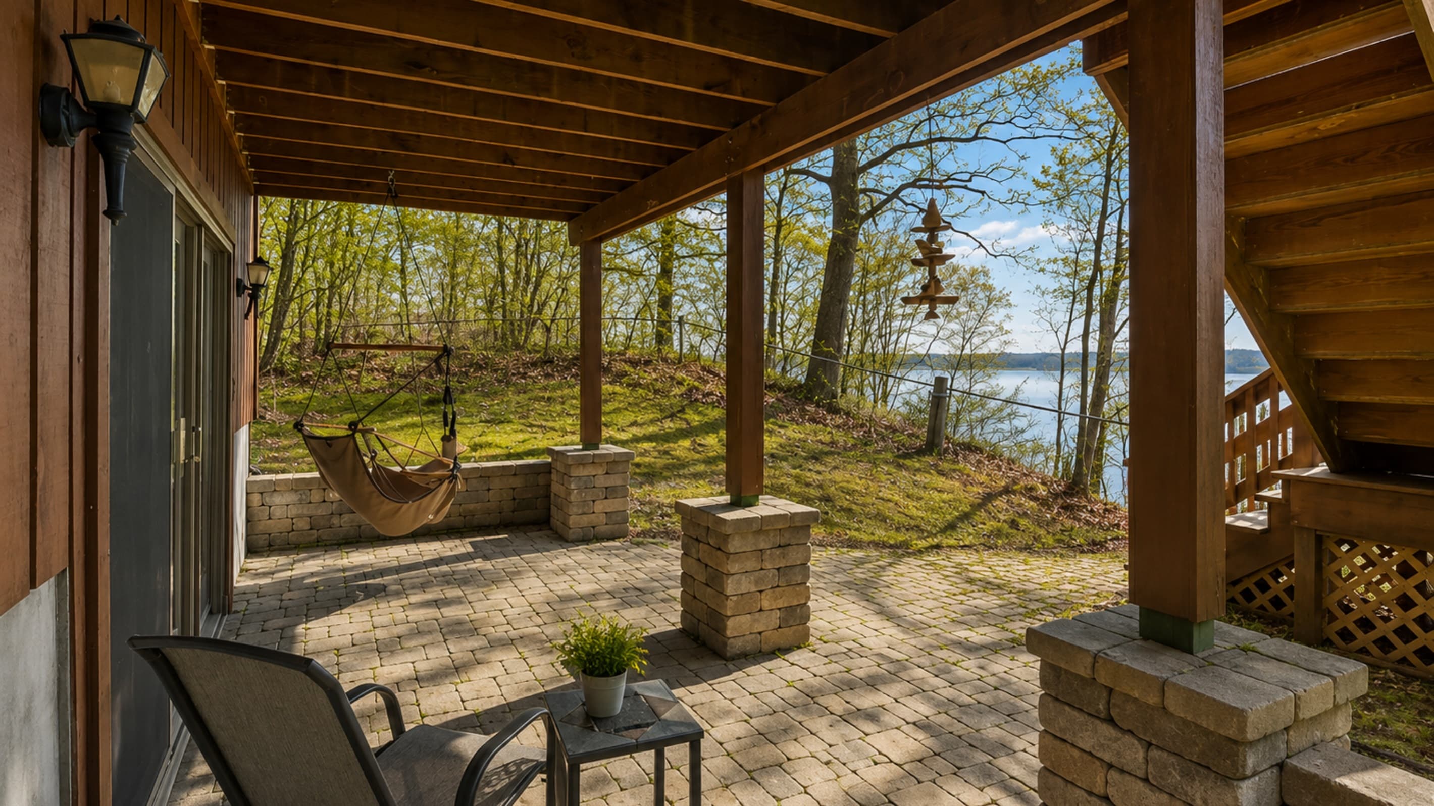 Covered lakeside porch with hammock