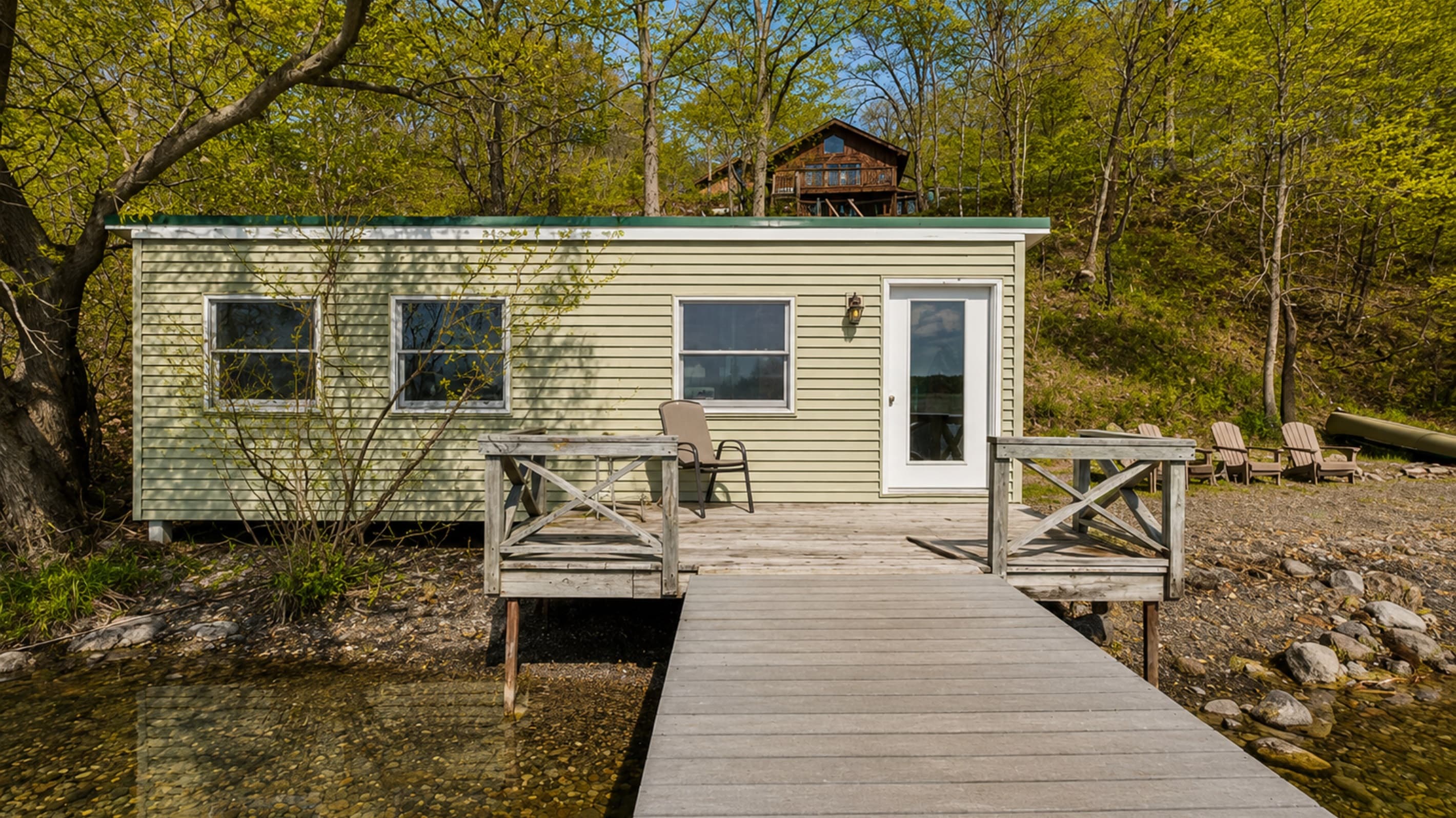 Lakeside boathouse with waterfront deck