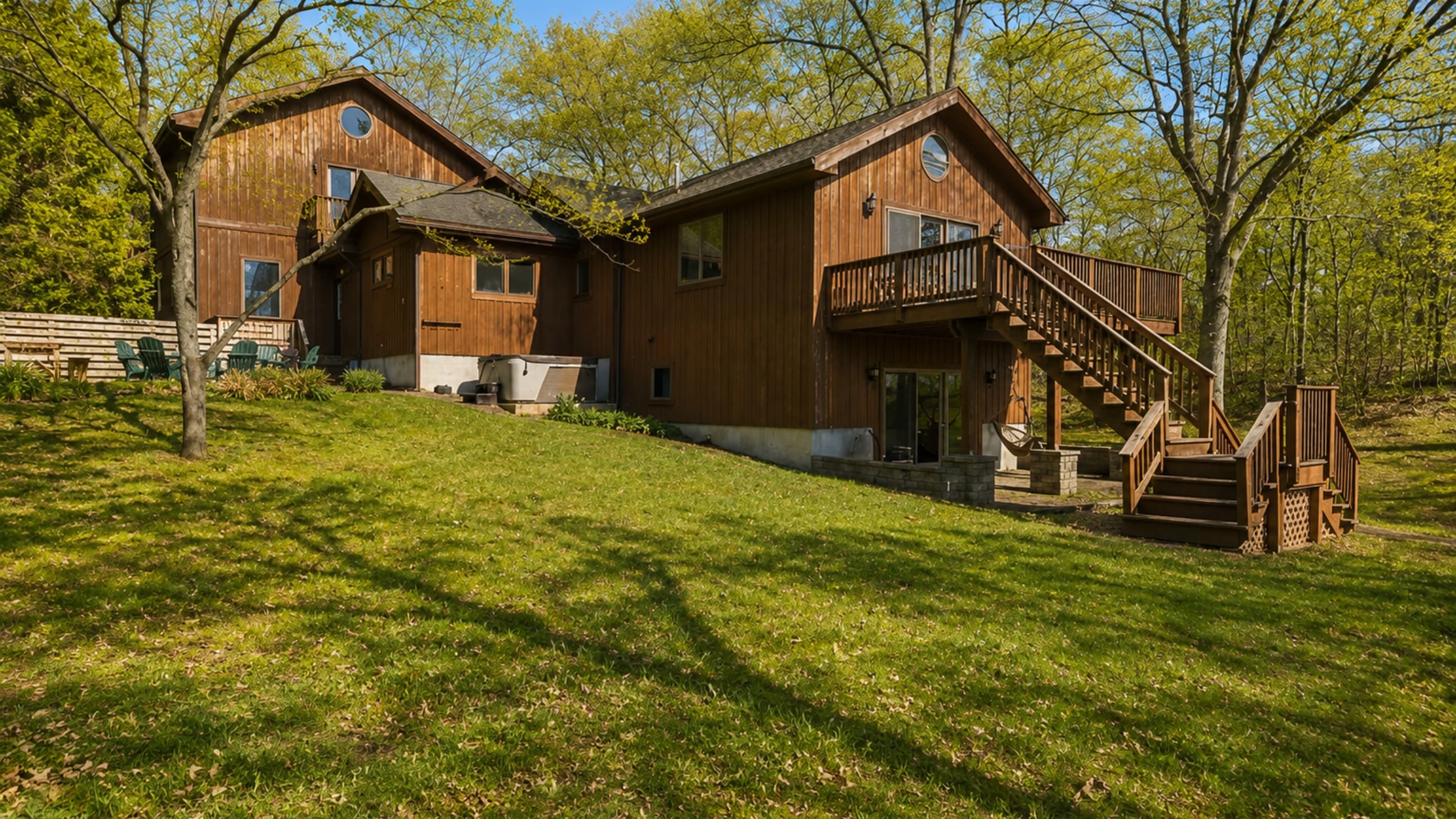 Main house exterior with spacious lawn