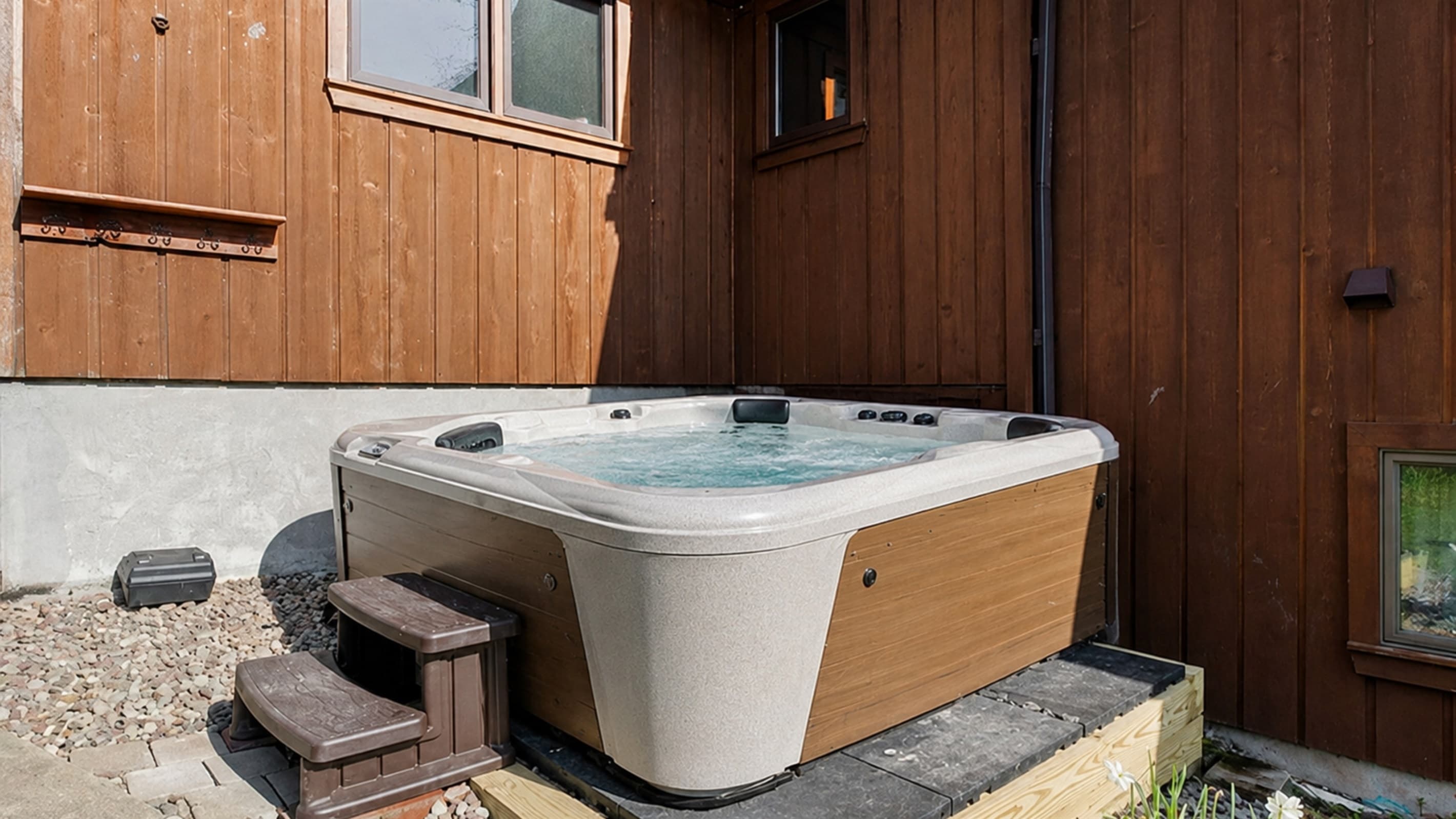 Private hot tub beside the main house