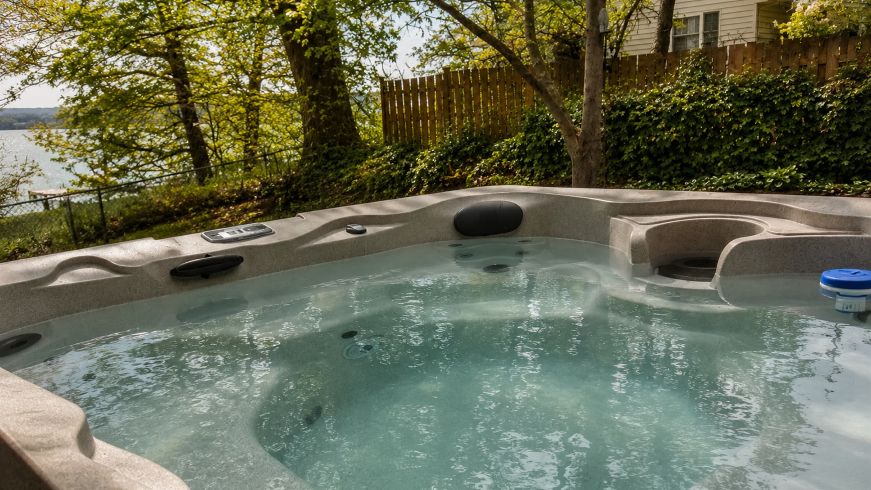Bubbling hot tub surrounded by trees