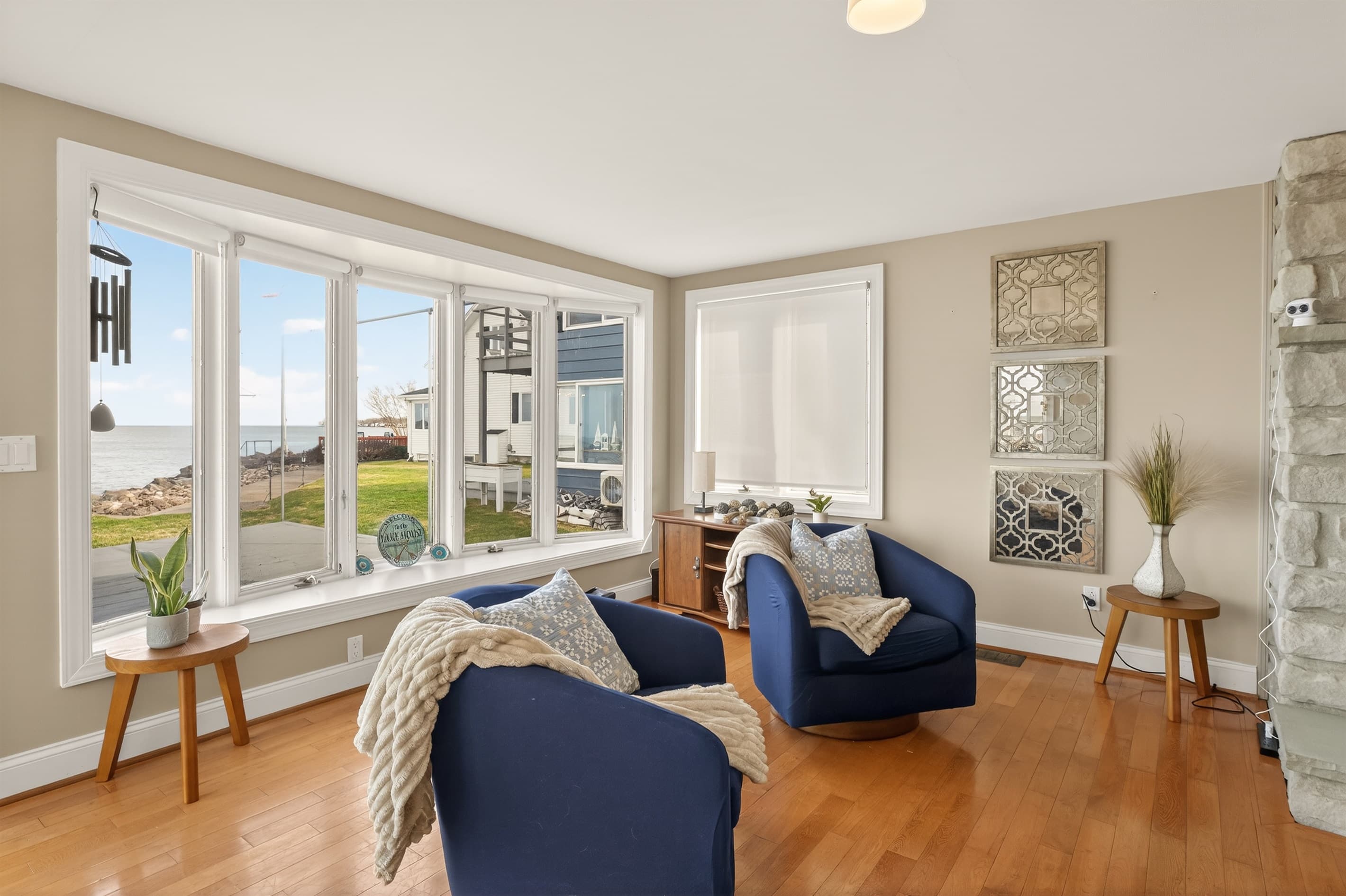 Living room seating beside glass doors