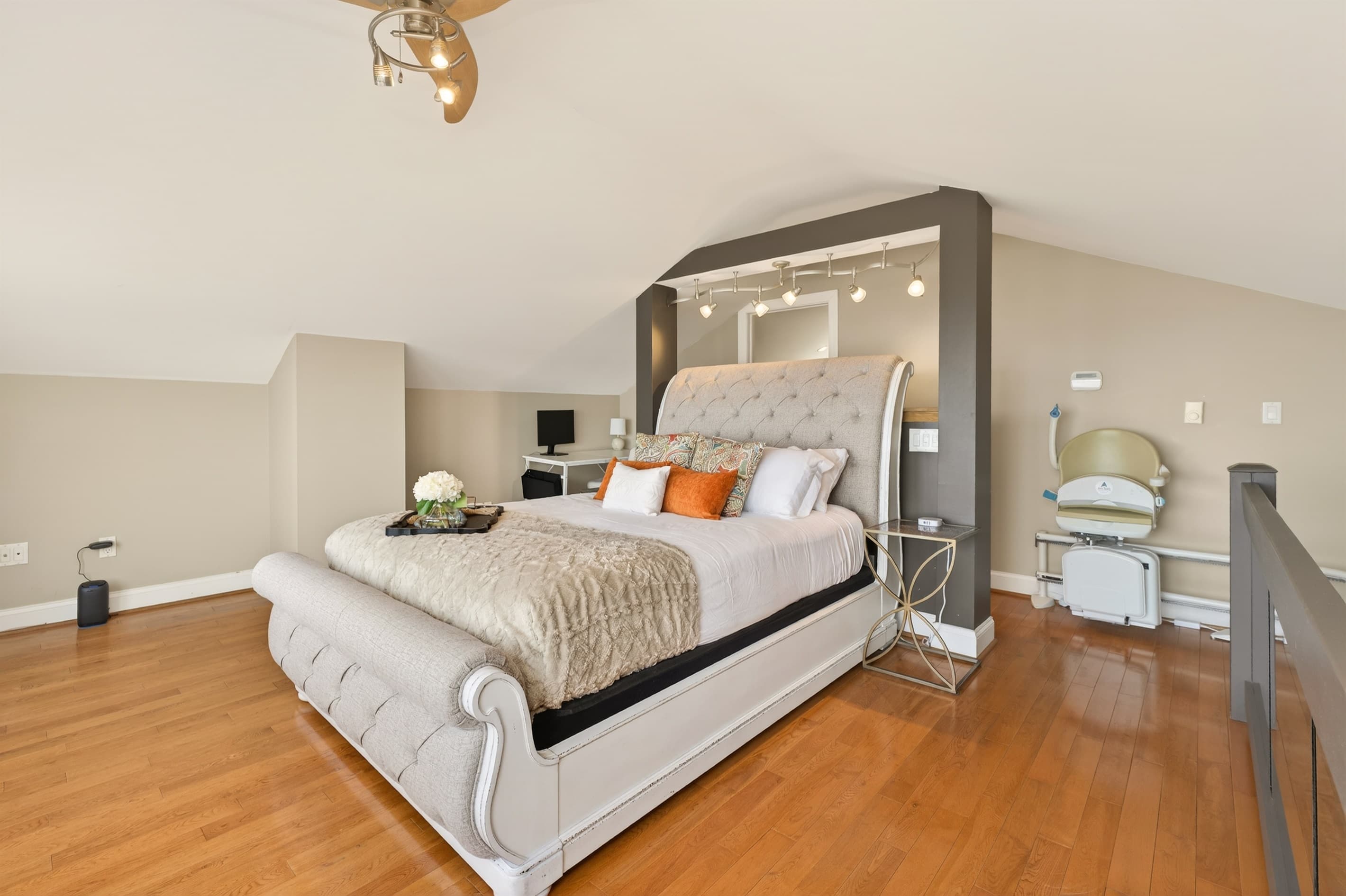 Bedroom with gold metal end table