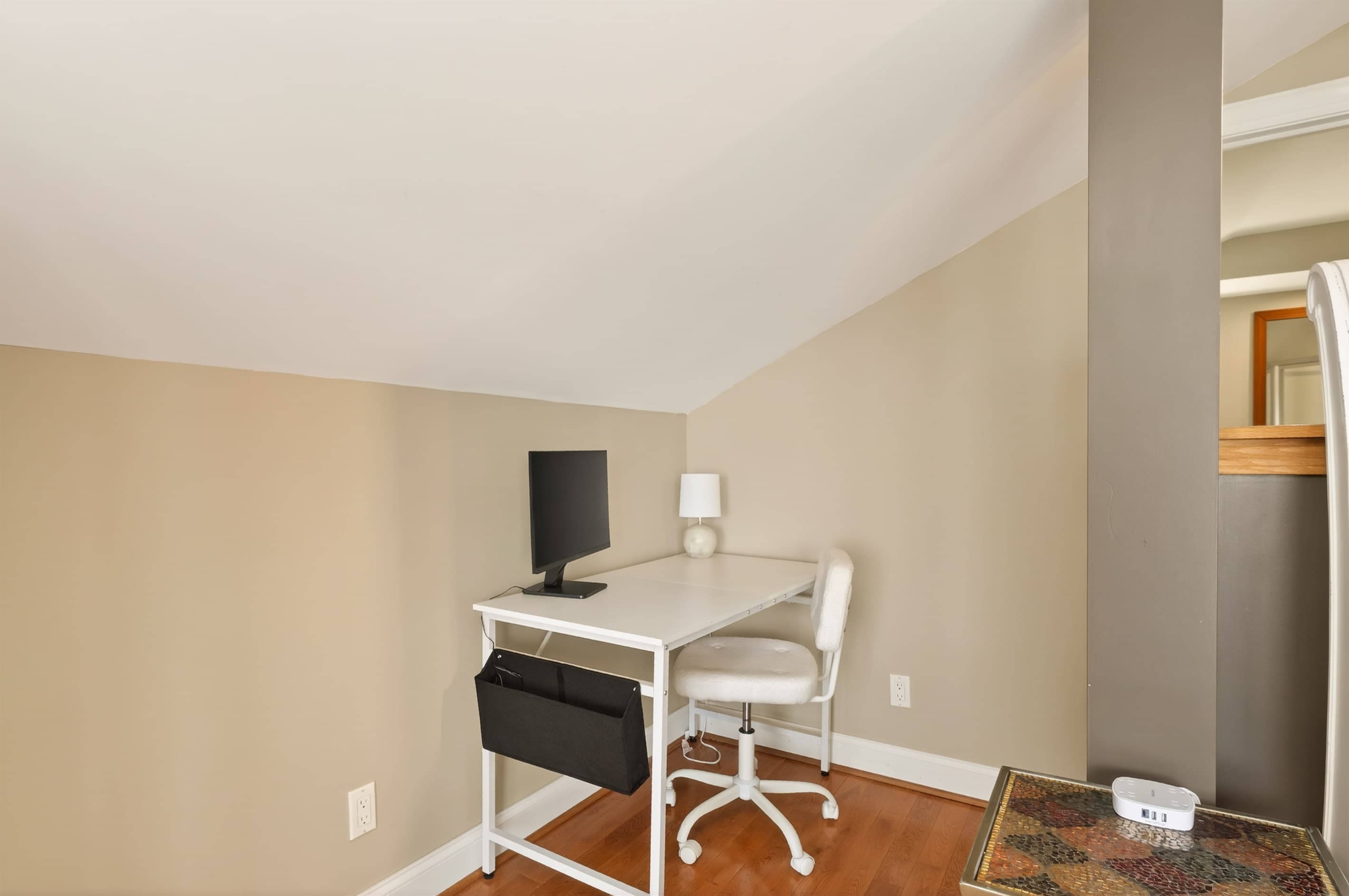 Small workspace with desk and computer