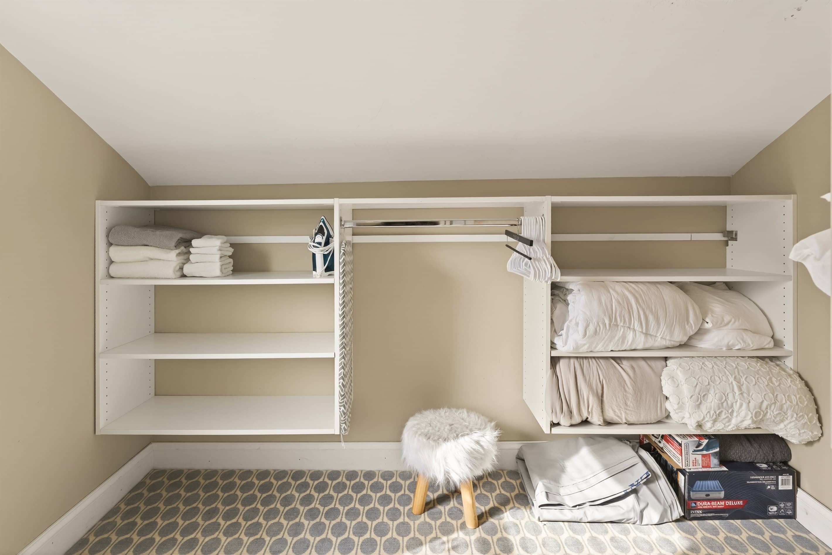 Walk-in closet with shelving and hanging space