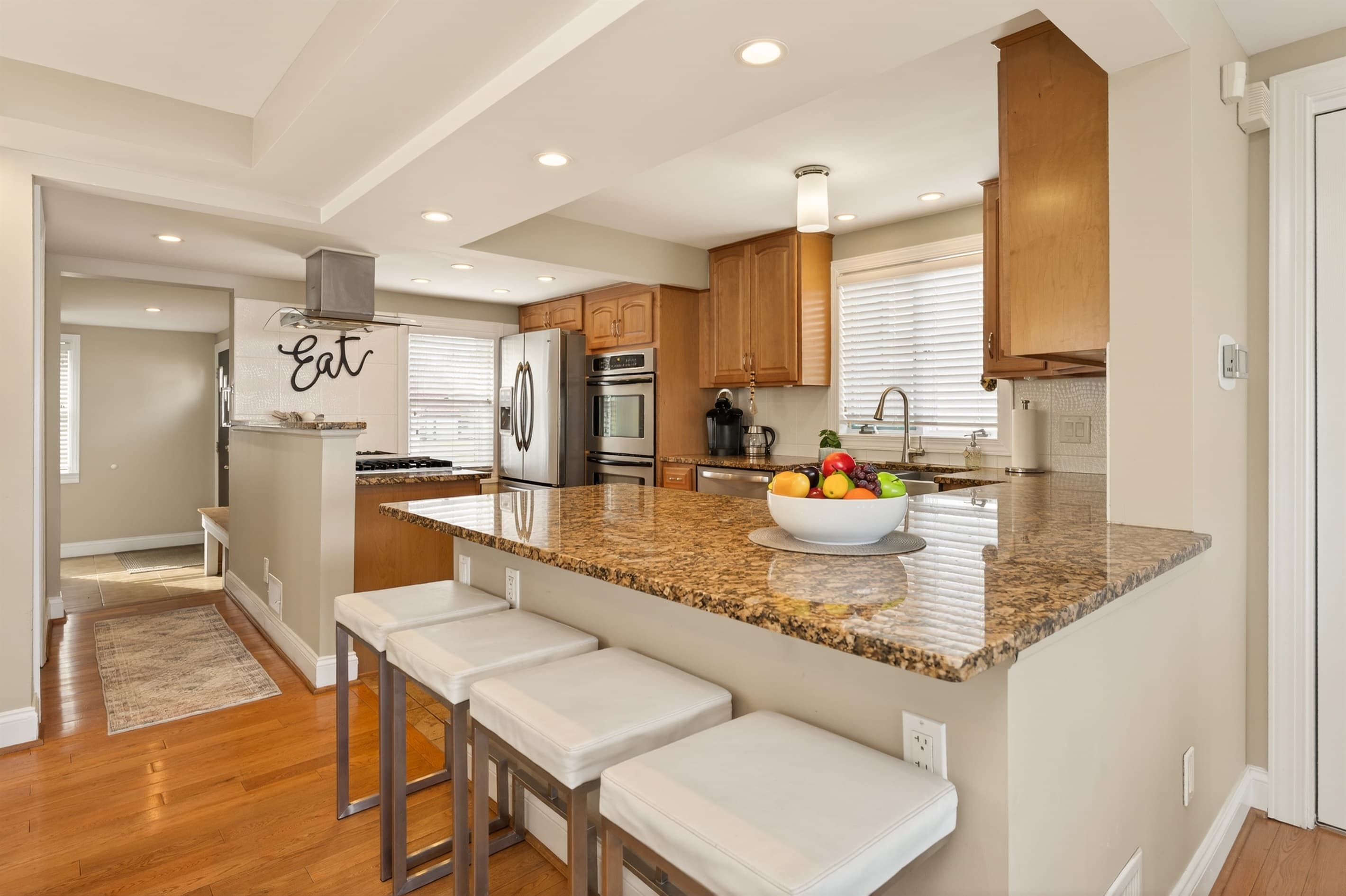 Open kitchen with island and stools