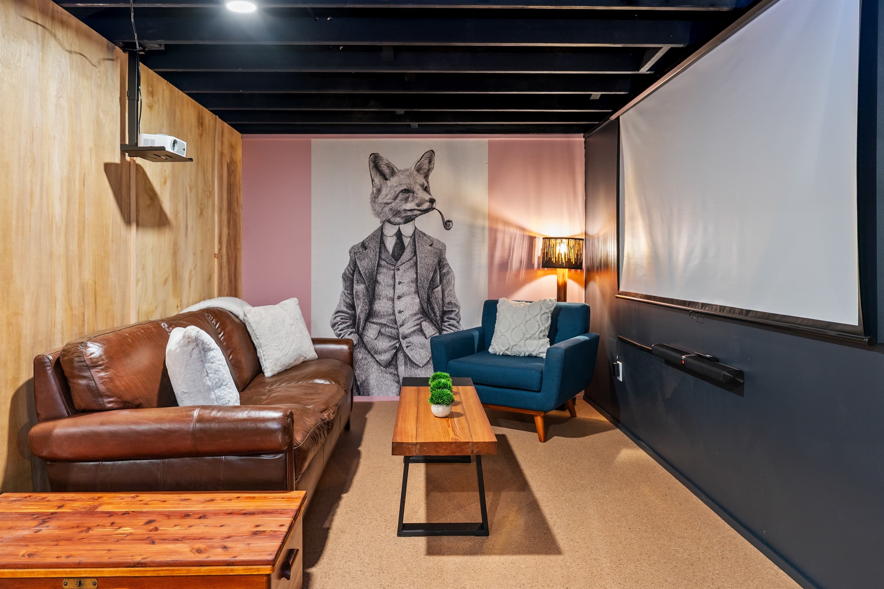 Lower-level lounge with projector screen