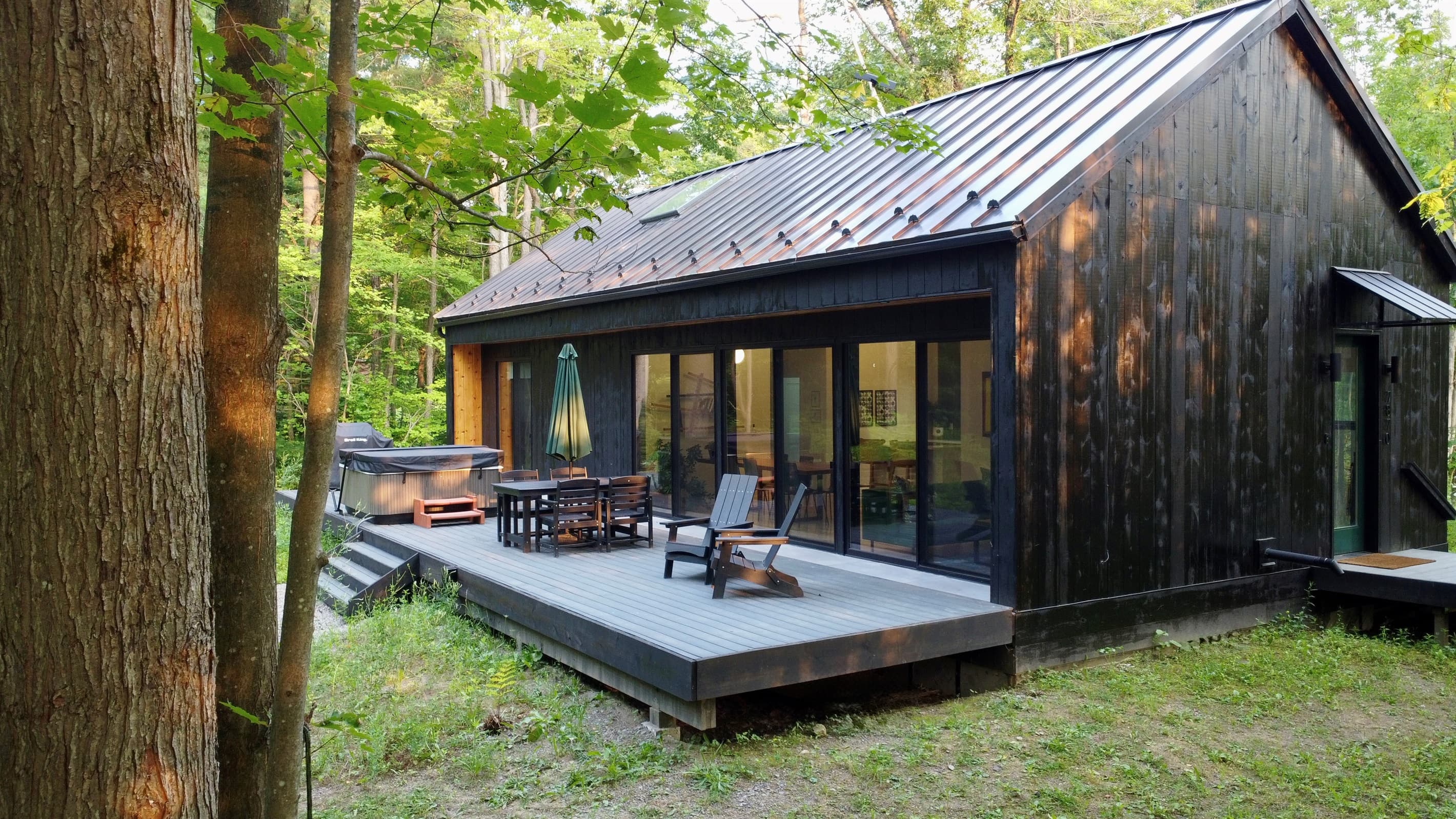 Modern cabin with expansive wooden deck