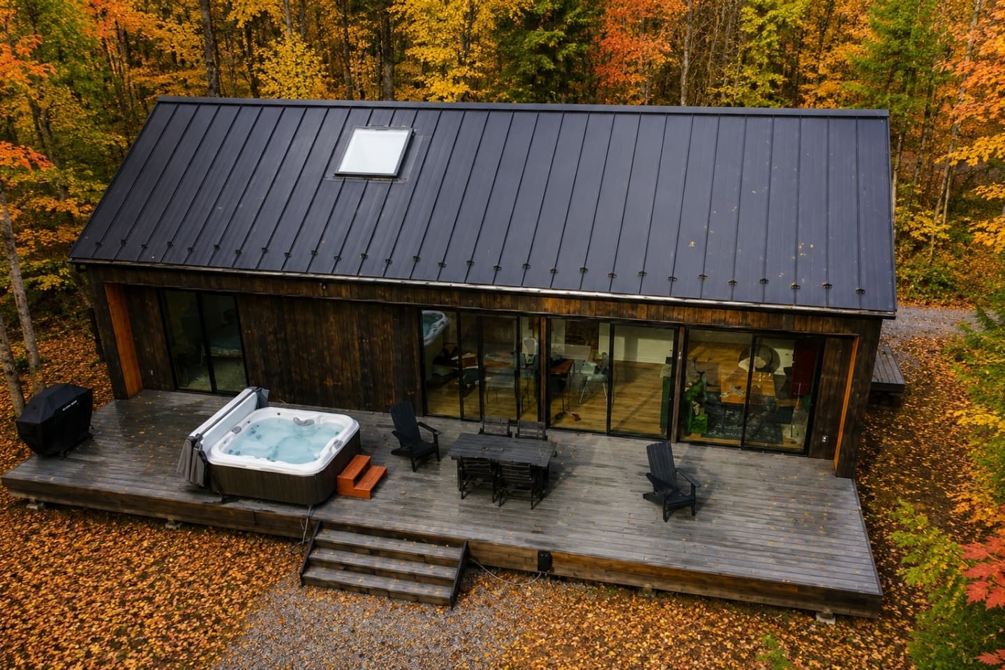 Aerial view of the cabin and hot tub