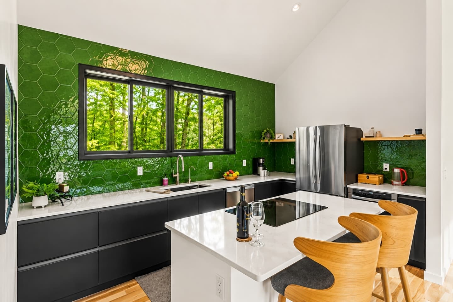Modern kitchen with green backsplash tiles