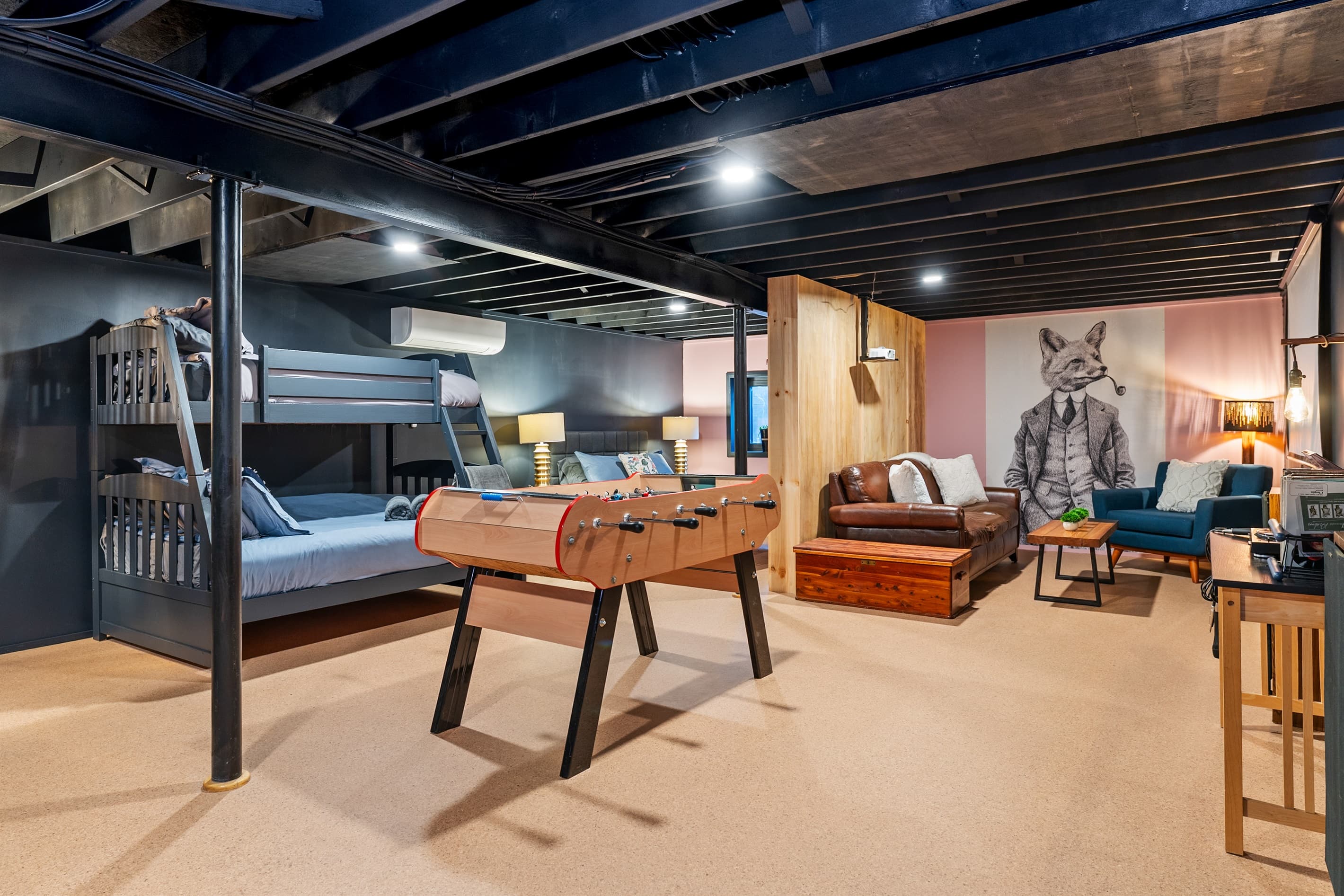 Lower-level entertainment room with foosball
