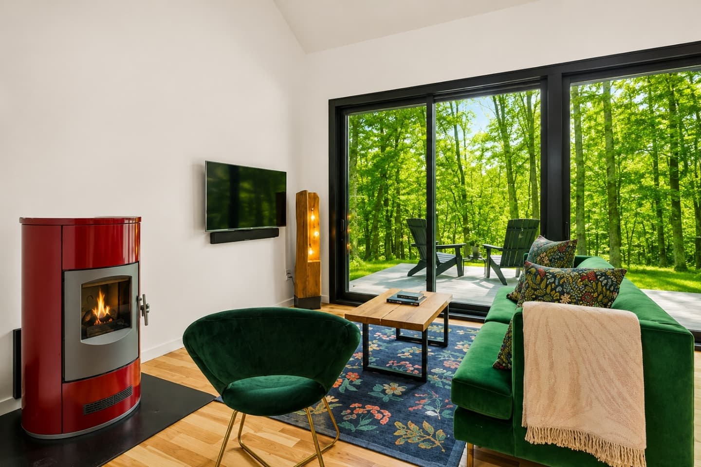 Living room with fireplace and wall mounted television