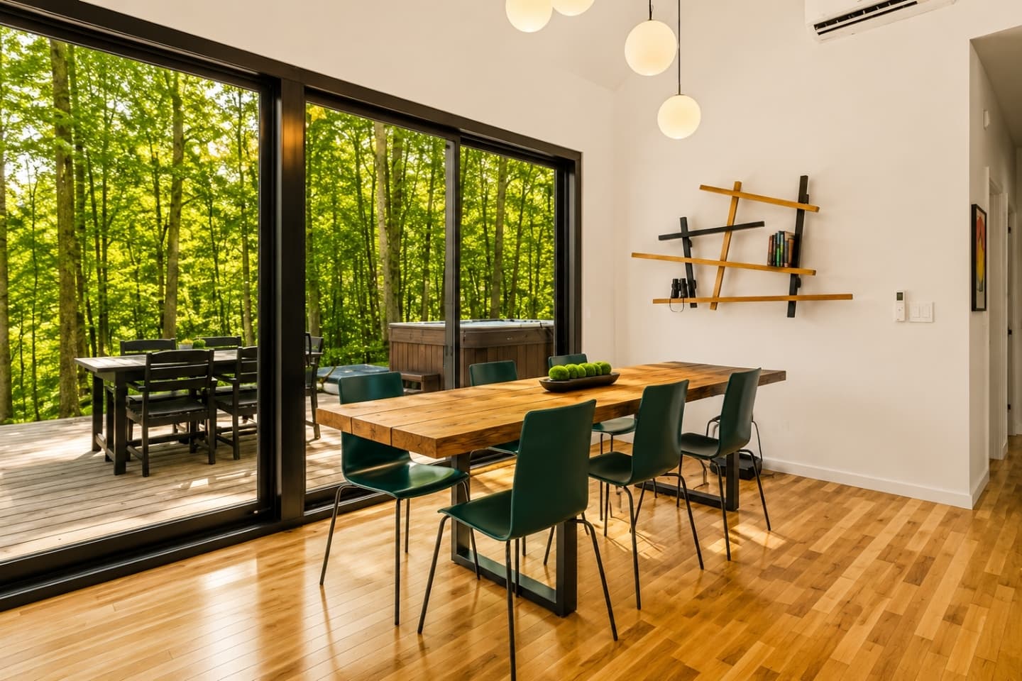 Dining table beside floor-to-ceiling windows