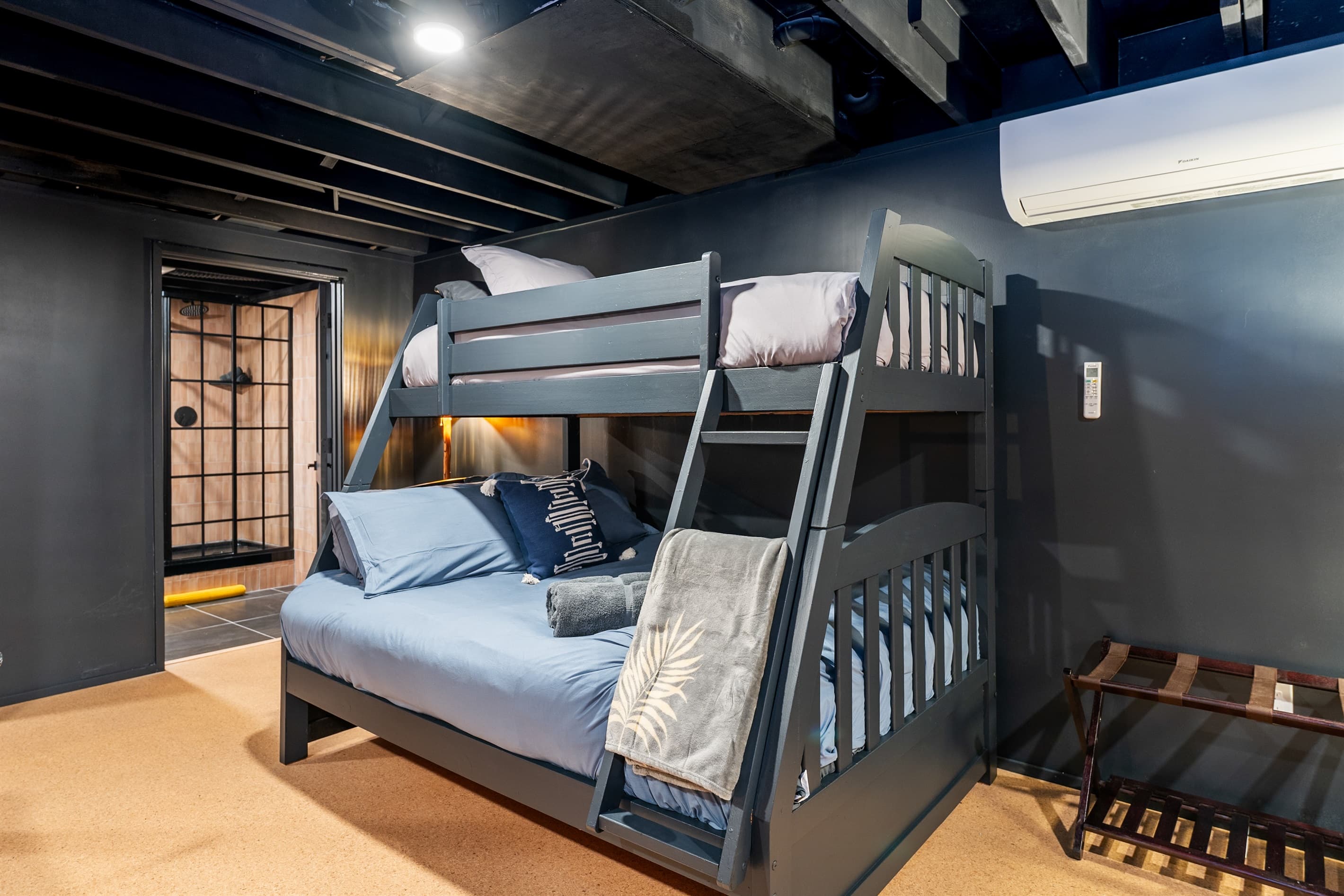 Bunk room with multiple sleeping spaces