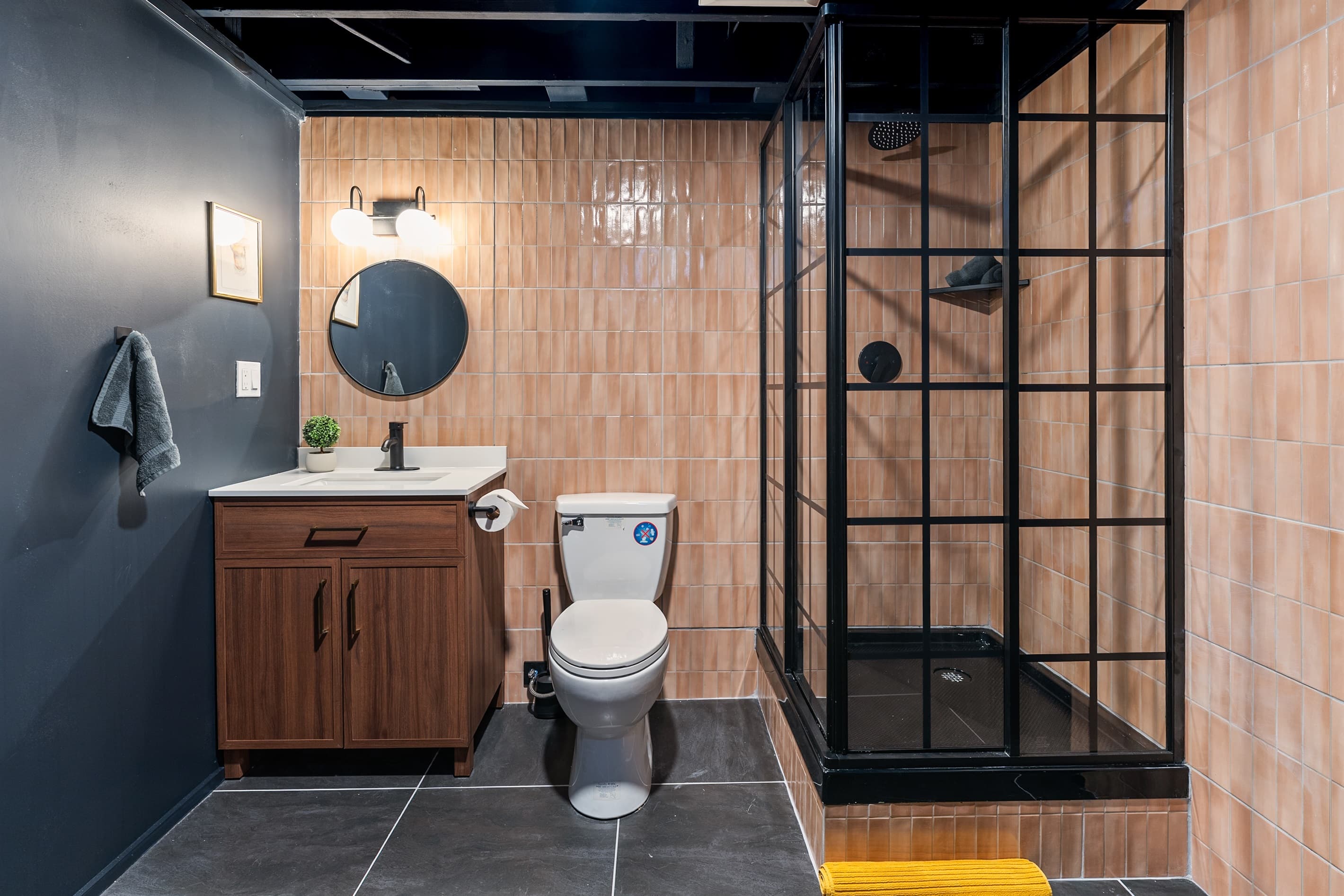 Bathroom with walk-in shower and vanity