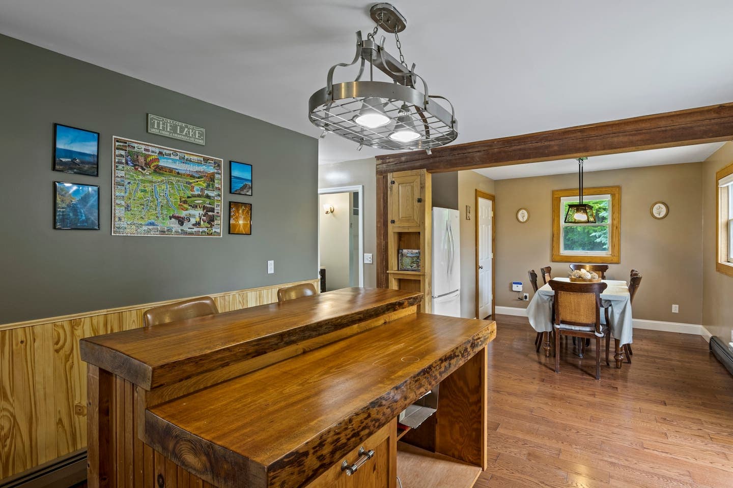 Kitchen island beneath pendant lighting