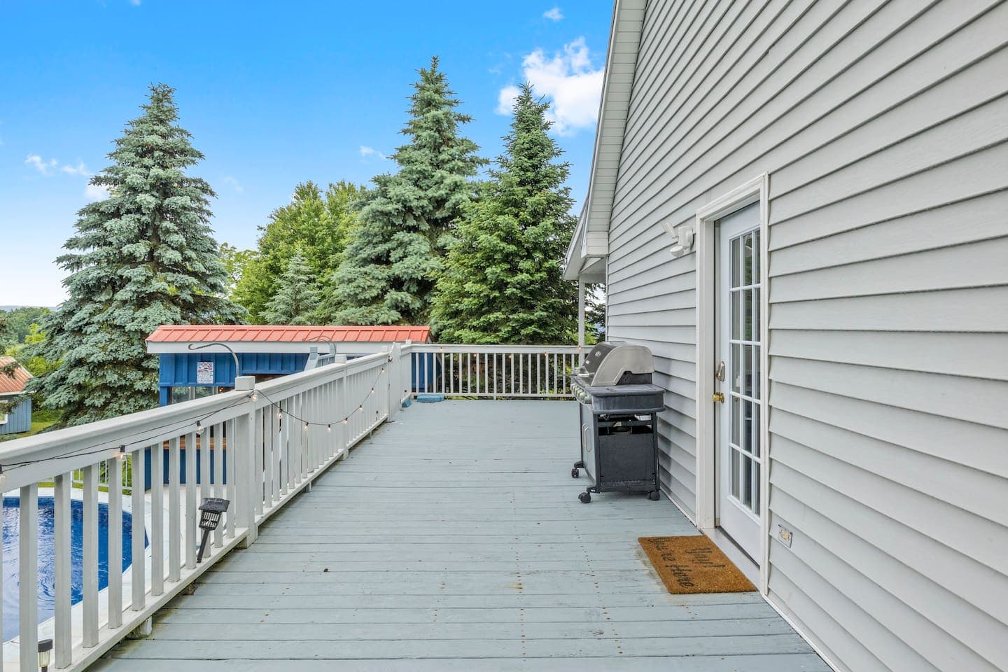 Outdoor dining table beside the house
