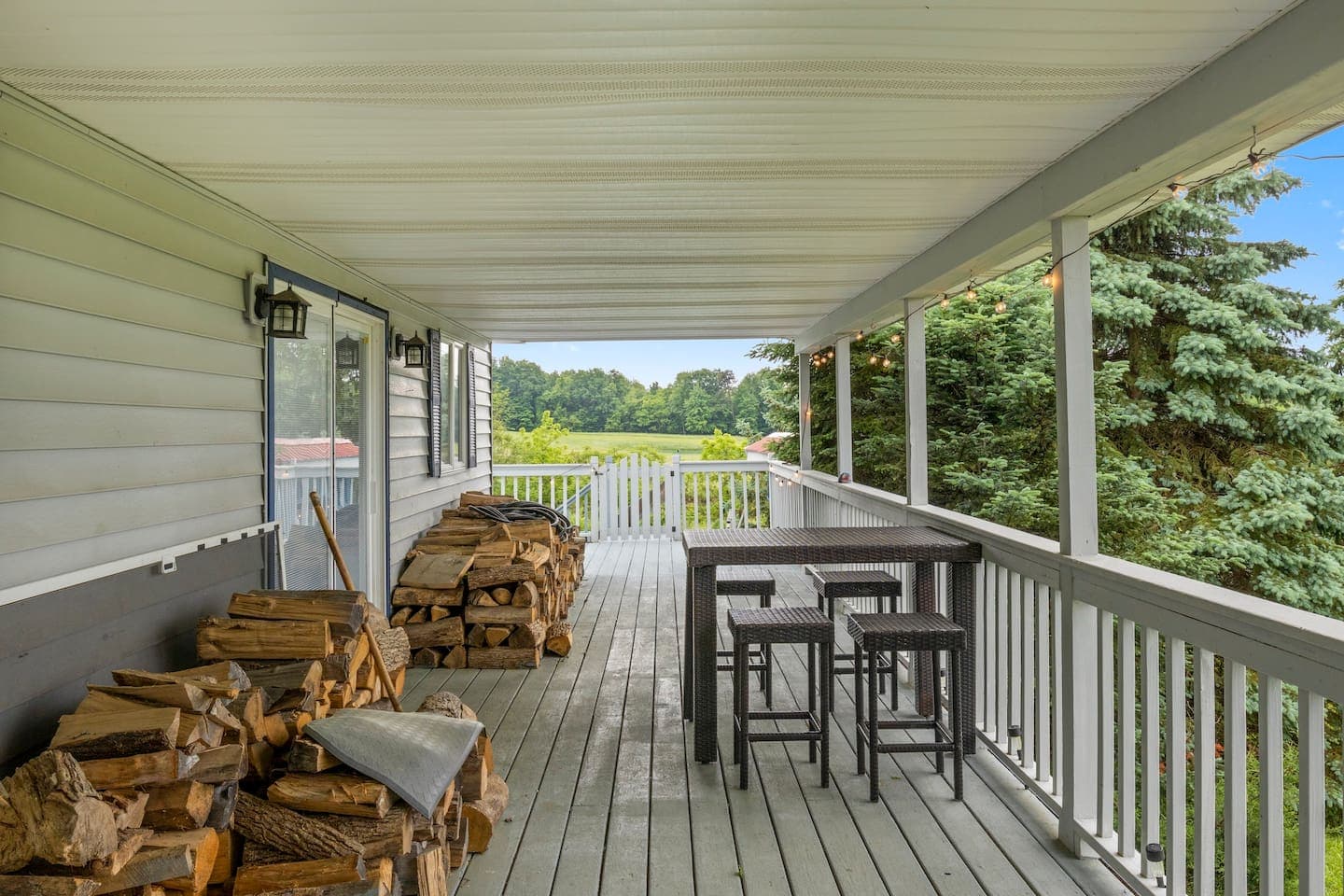 Covered deck with dining furniture