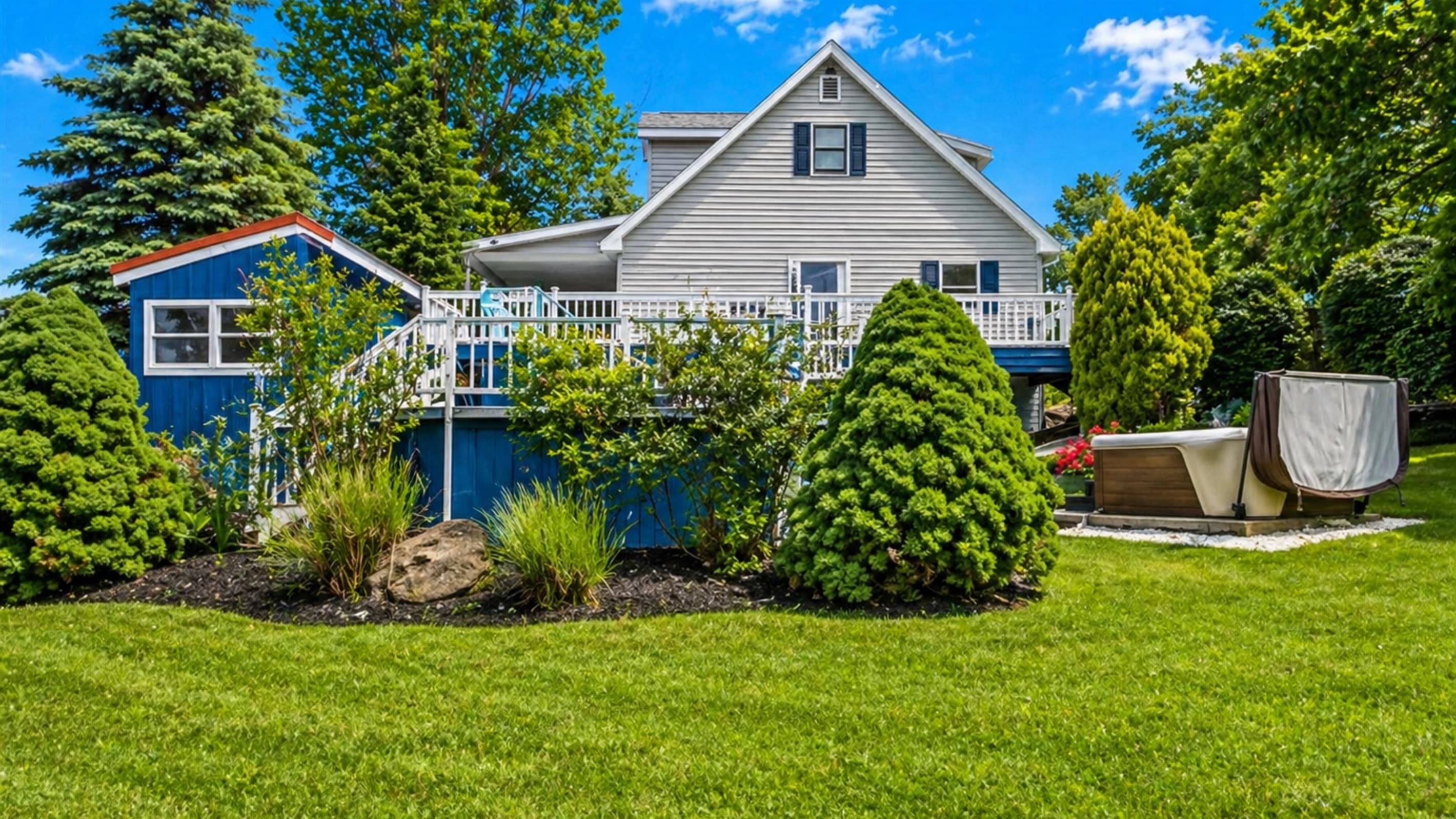 Backyard exterior with mature landscaping