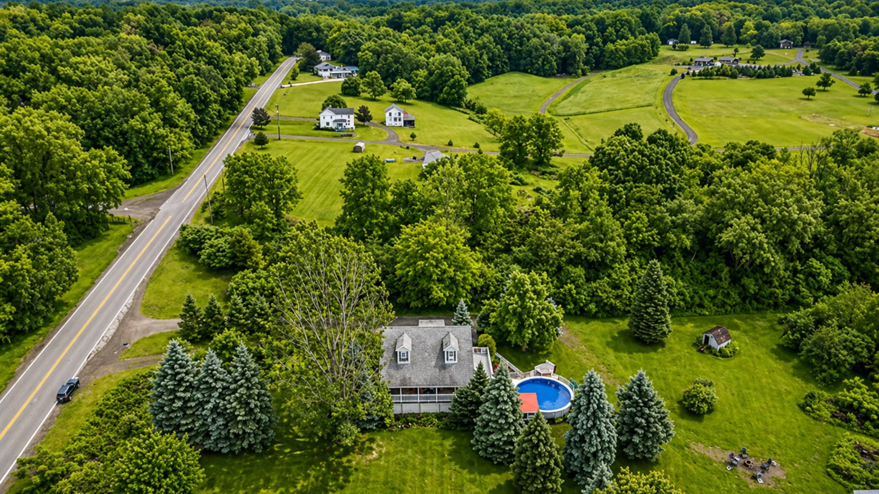 Aerial view of the house and property