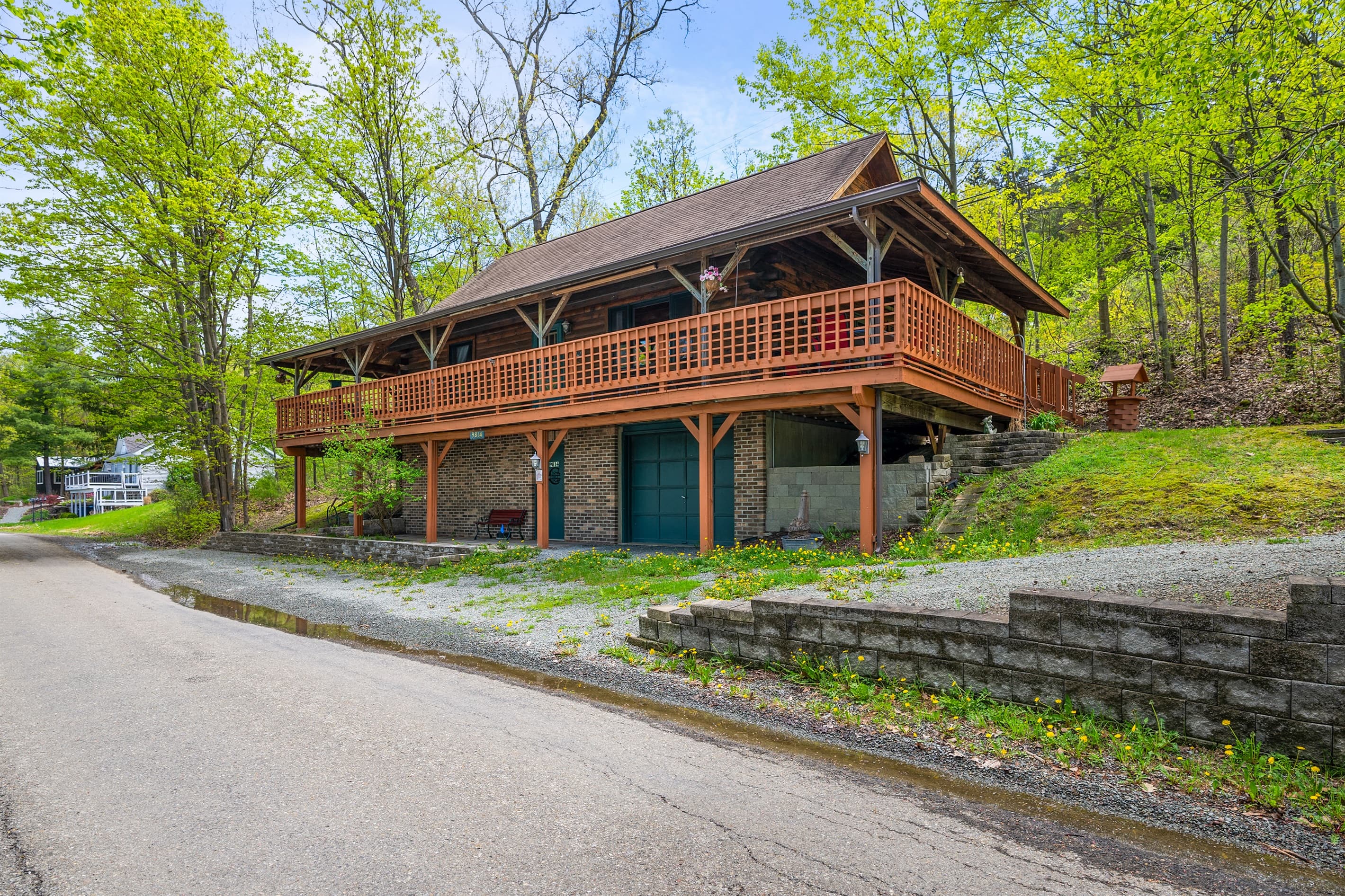 Log cabin with wraparound porch