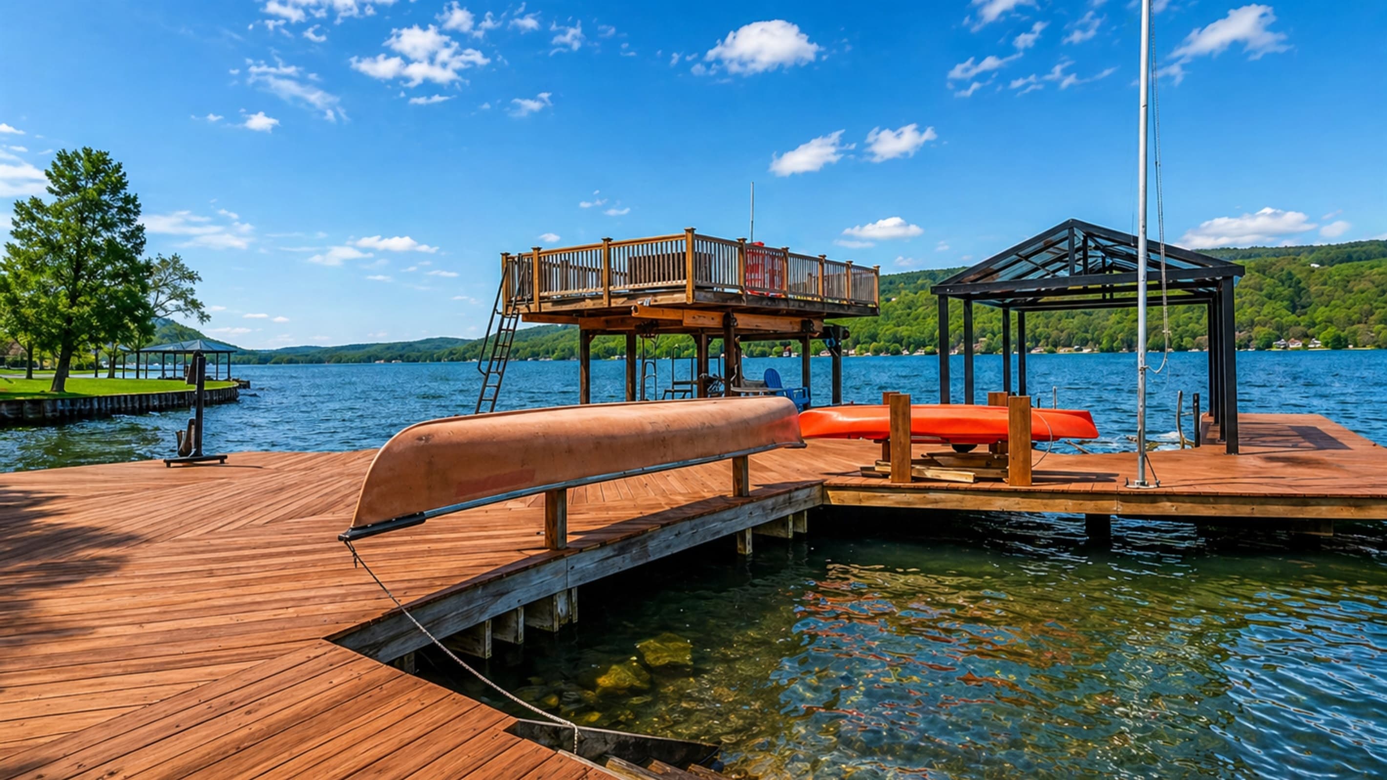 Lakefront deck with seating, and a canoe