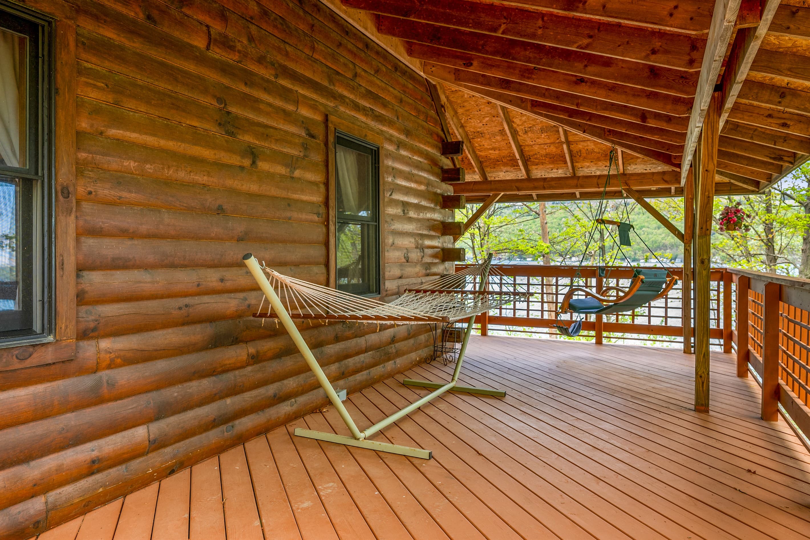 Hammock beneath exposed porch rafters