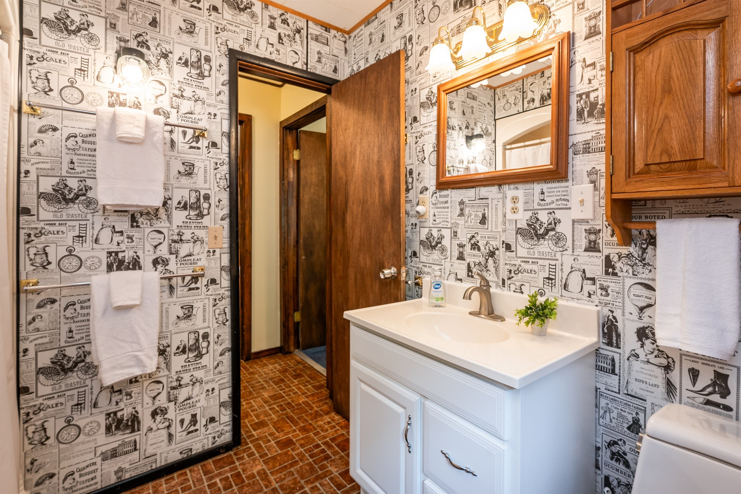 Patterned bathroom with white vanity