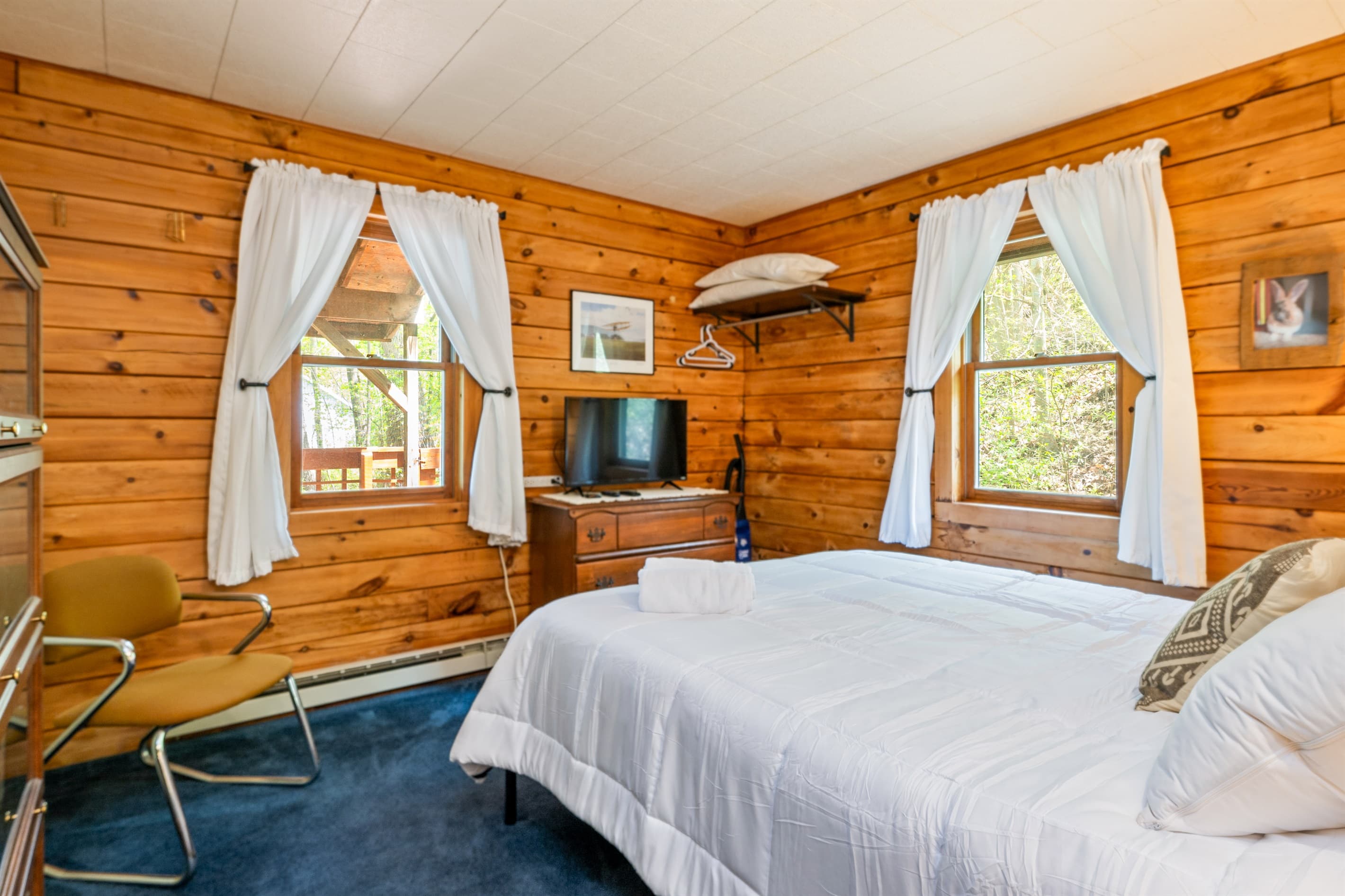 Bedroom with windows on adjacent walls