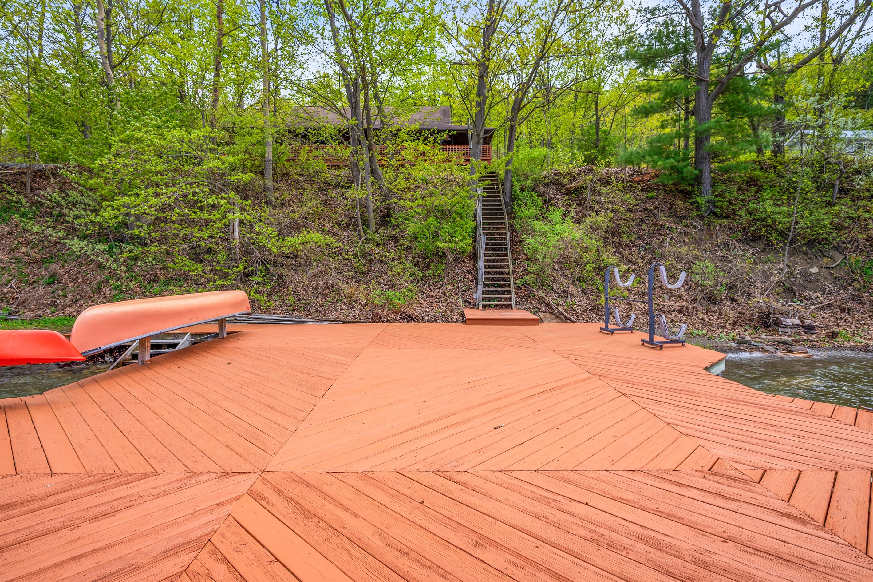Elevated deck beneath surrounding trees