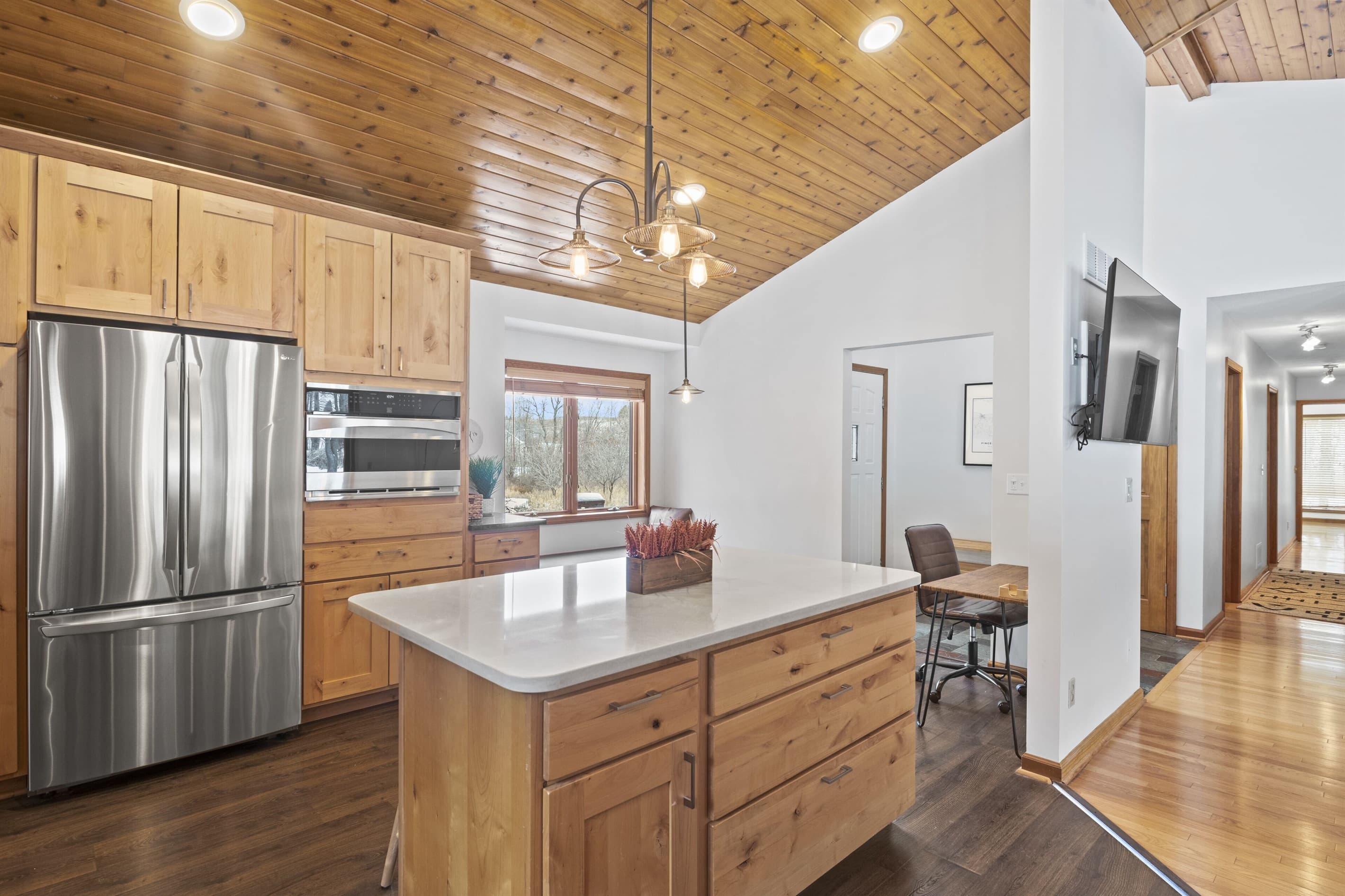 Kitchen with island and stainless steel appliances