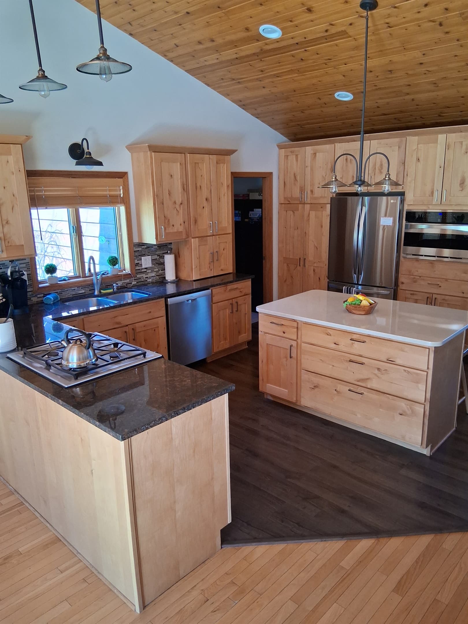 Kitchen with island and gas cooktop