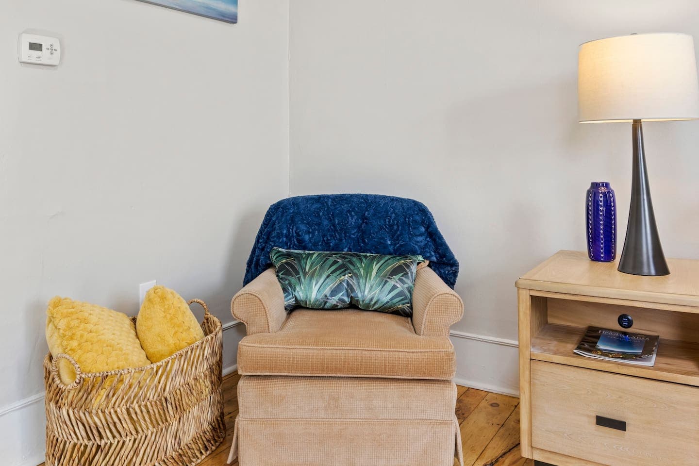 Reading nook with blue accent chair