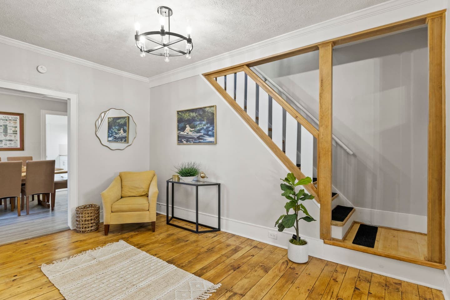 Entryway with staircase and bench seating