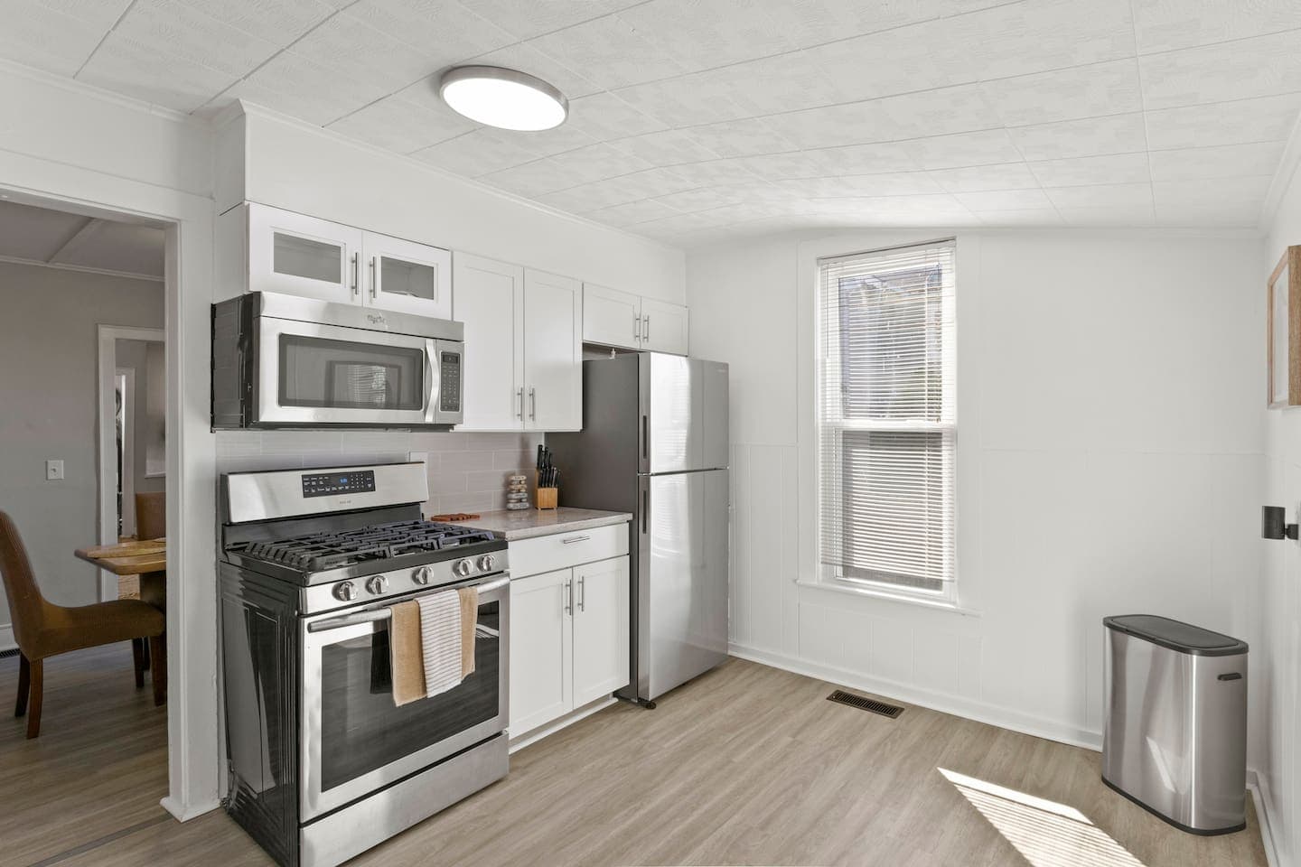 Kitchen corner with refrigerator and microwave