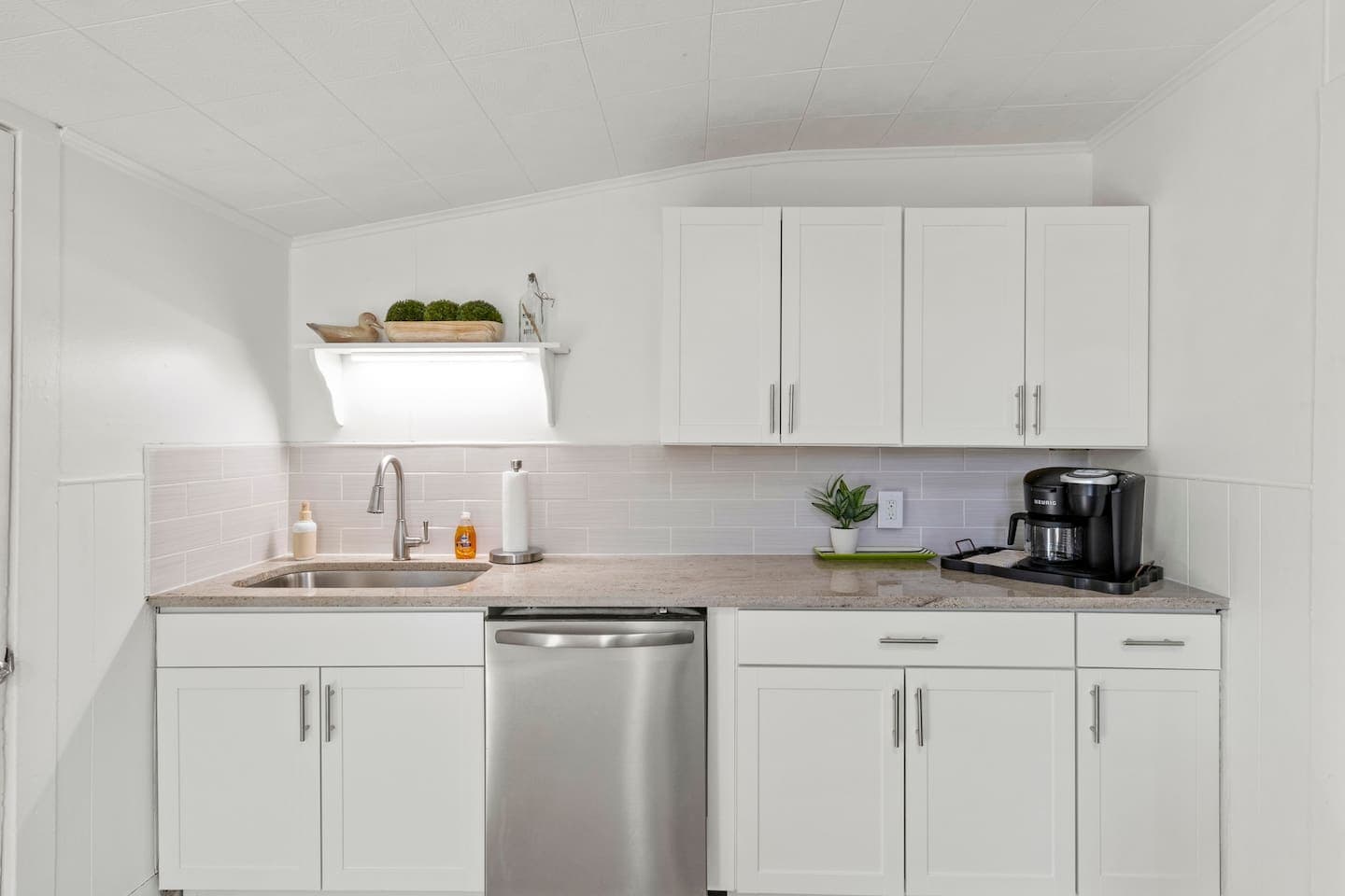 Kitchen workspace with coffee station and island