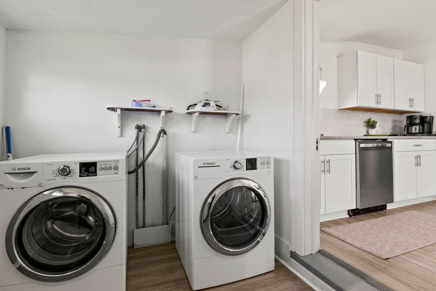 Laundry room with side-by-side machines