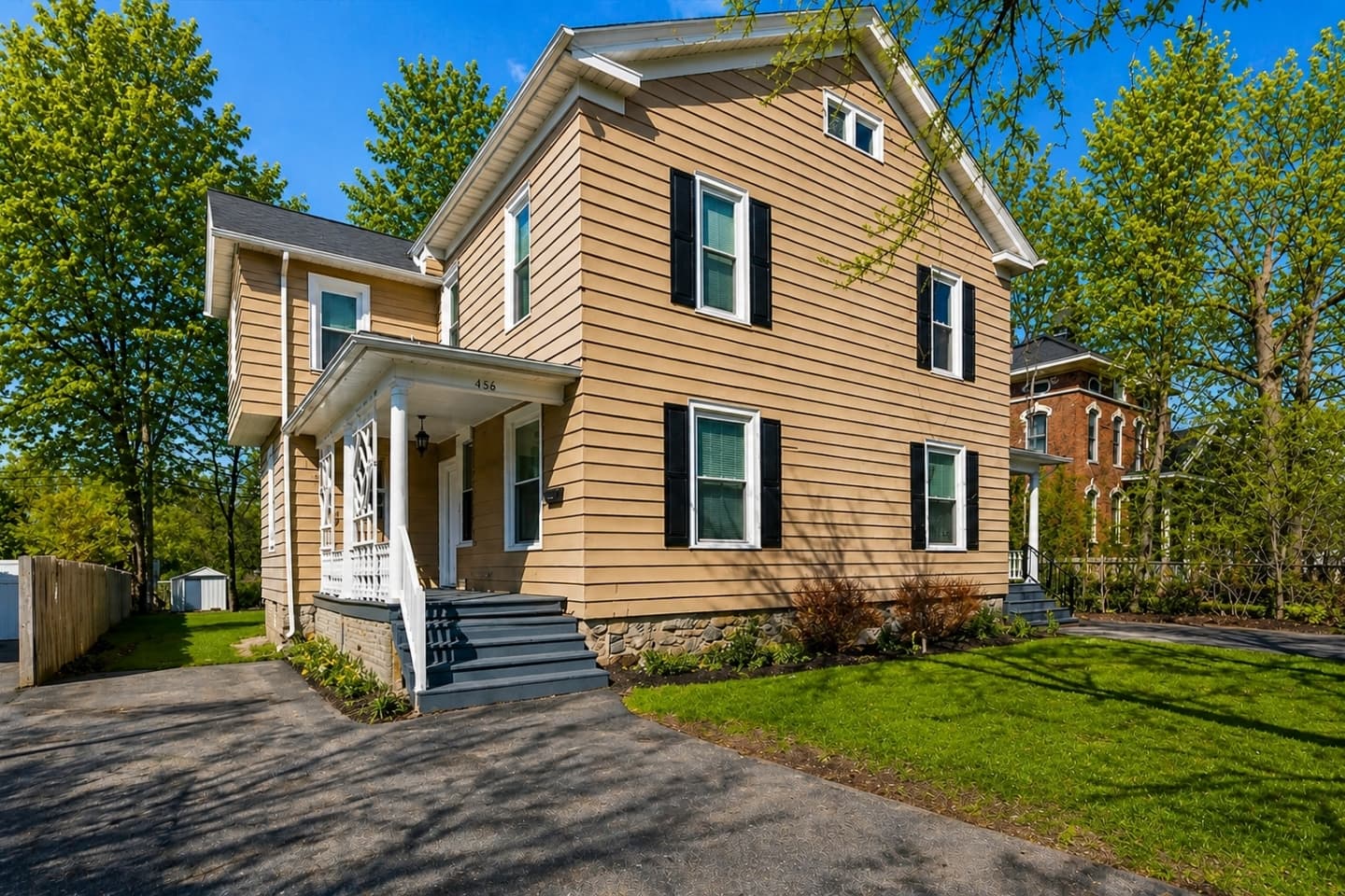 Front exterior with enclosed entry porch