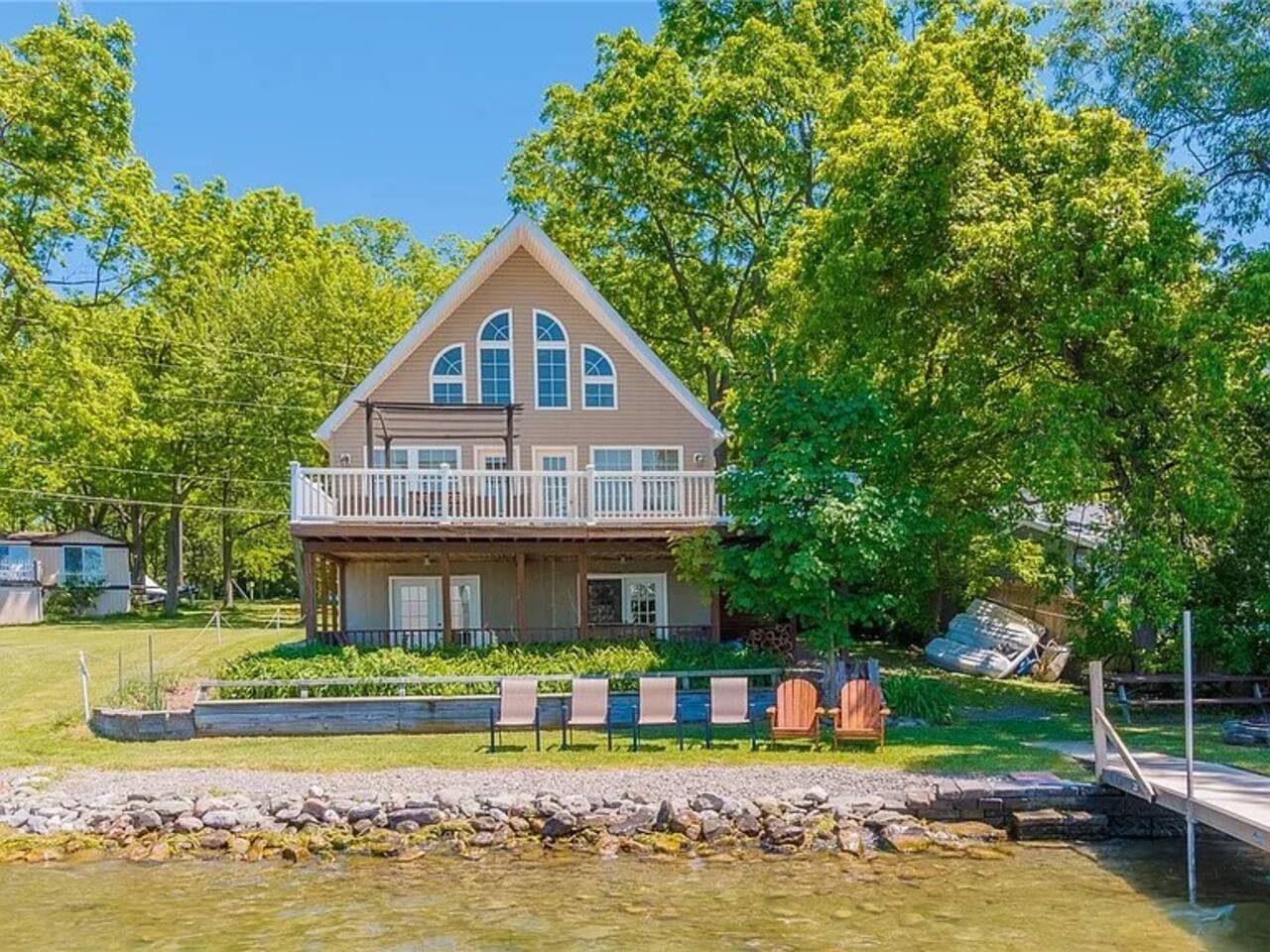 Lake-facing exterior with expansive windows