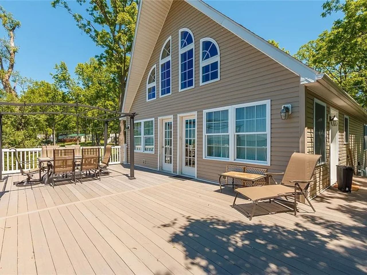 Spacious deck with outdoor dining and seating