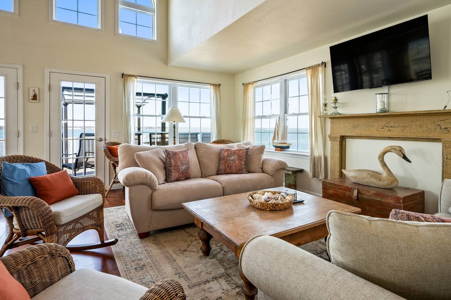 Living room with mounted television and sectional