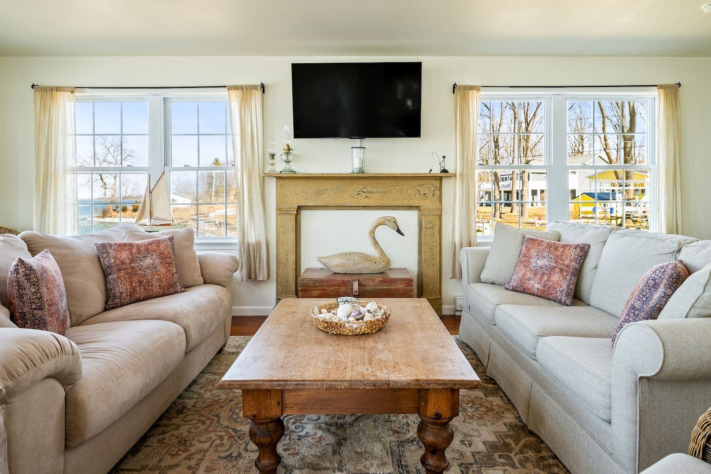 Sunlit seating area beside large windows