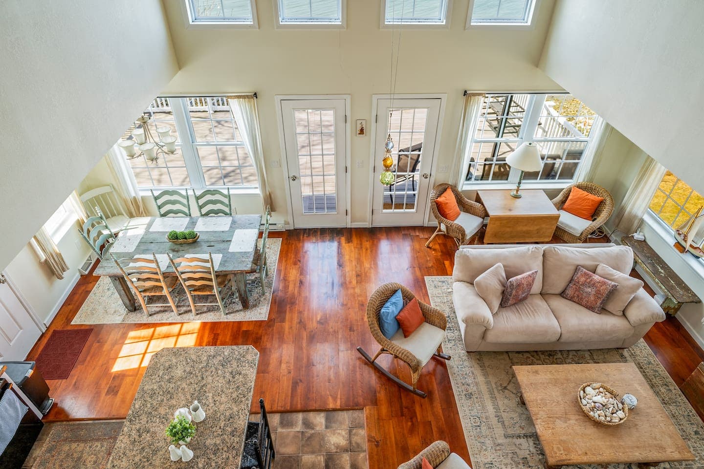 Great room with vaulted ceiling and hardwood floors